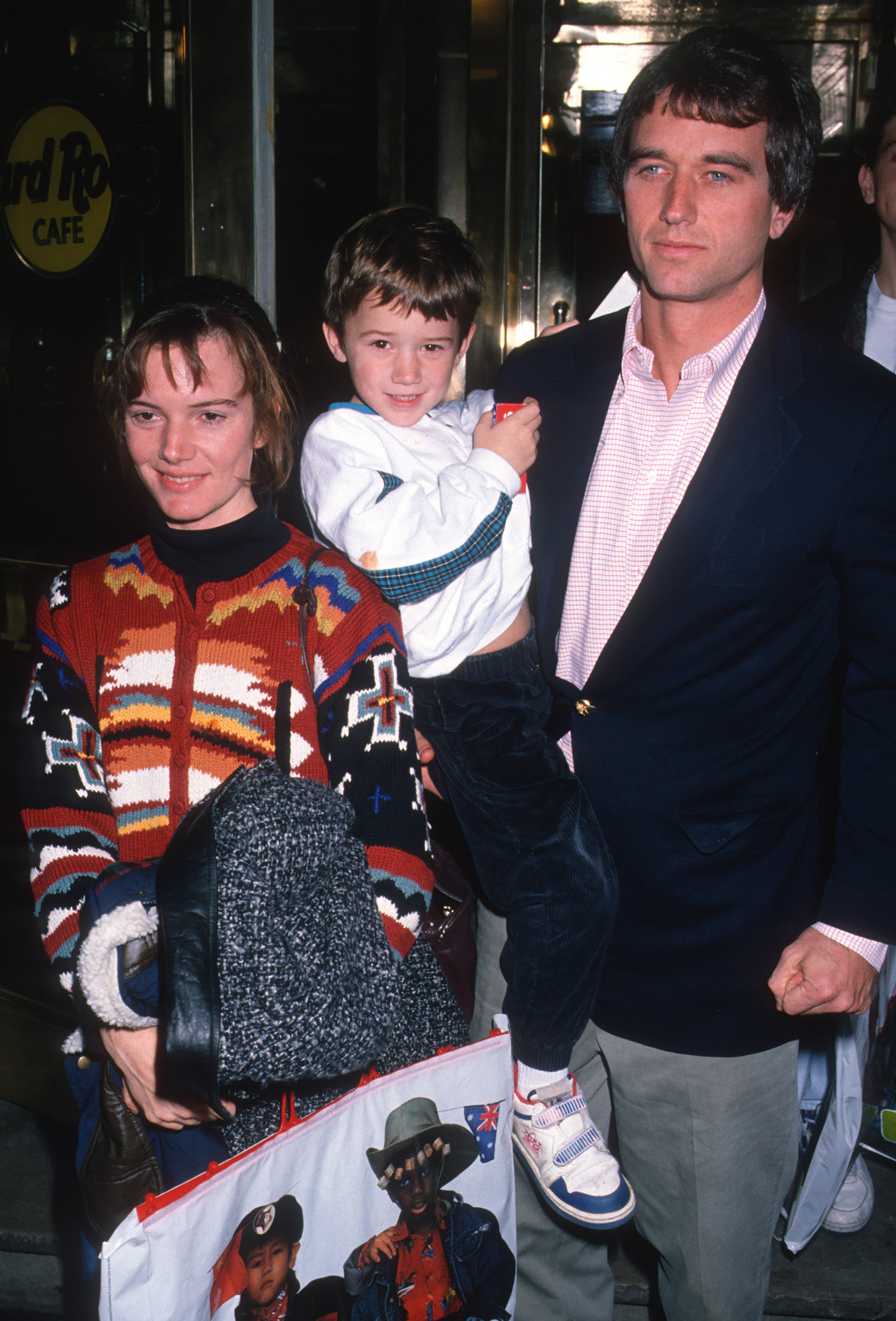 Emily Ruth Black and Robert F. Kennedy Jr. with their son at the Hard Rock Café in New York on November 18, 1989. | Source: Getty Images
