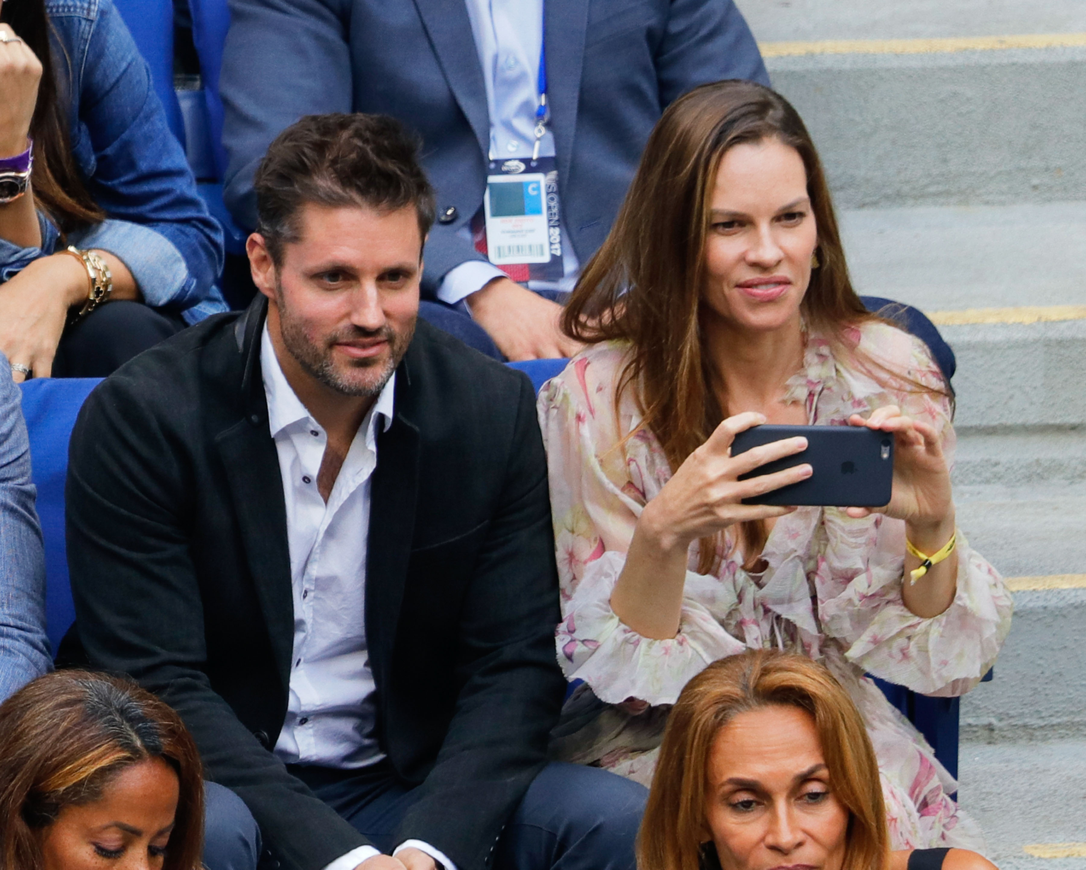 Hilary Swank and Philip Schneider during the 2017 US Open Women's Final at Arthur Ashe Stadium on September 9, 2017 in New York City