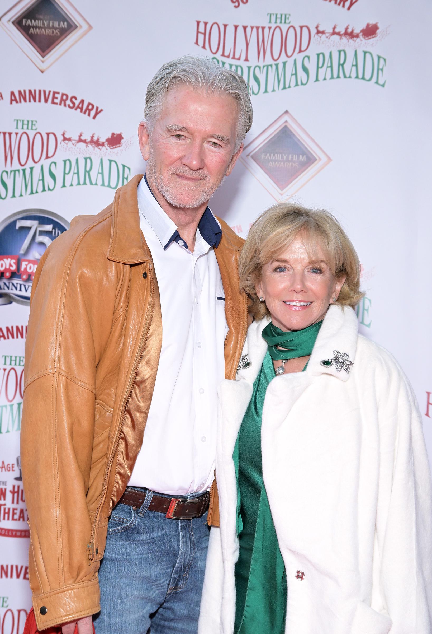 Bundled up for the festive season alongside Patrick Duffy, 67-year-old Linda Purl attended the 90th Anniversary of the Hollywood Christmas Parade on November 27, 2022, in Hollywood, California. A plush white winter coat layered over an emerald-green satin blouse and matching neck scarf offered a stylish contrast, while her soft blonde bob and radiant smile showcased the joyful, poised elegance of her late 60s. | Source: Getty Images