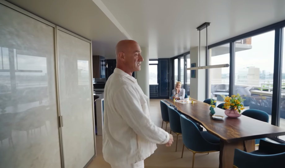 The long dining table brings decades of family history into a home where many other pieces were chosen specifically for the renovation. Its natural timber edge fits perfectly with Christopher and Sherman's love of organic materials. | Source: YouTube/Architectural Digest
