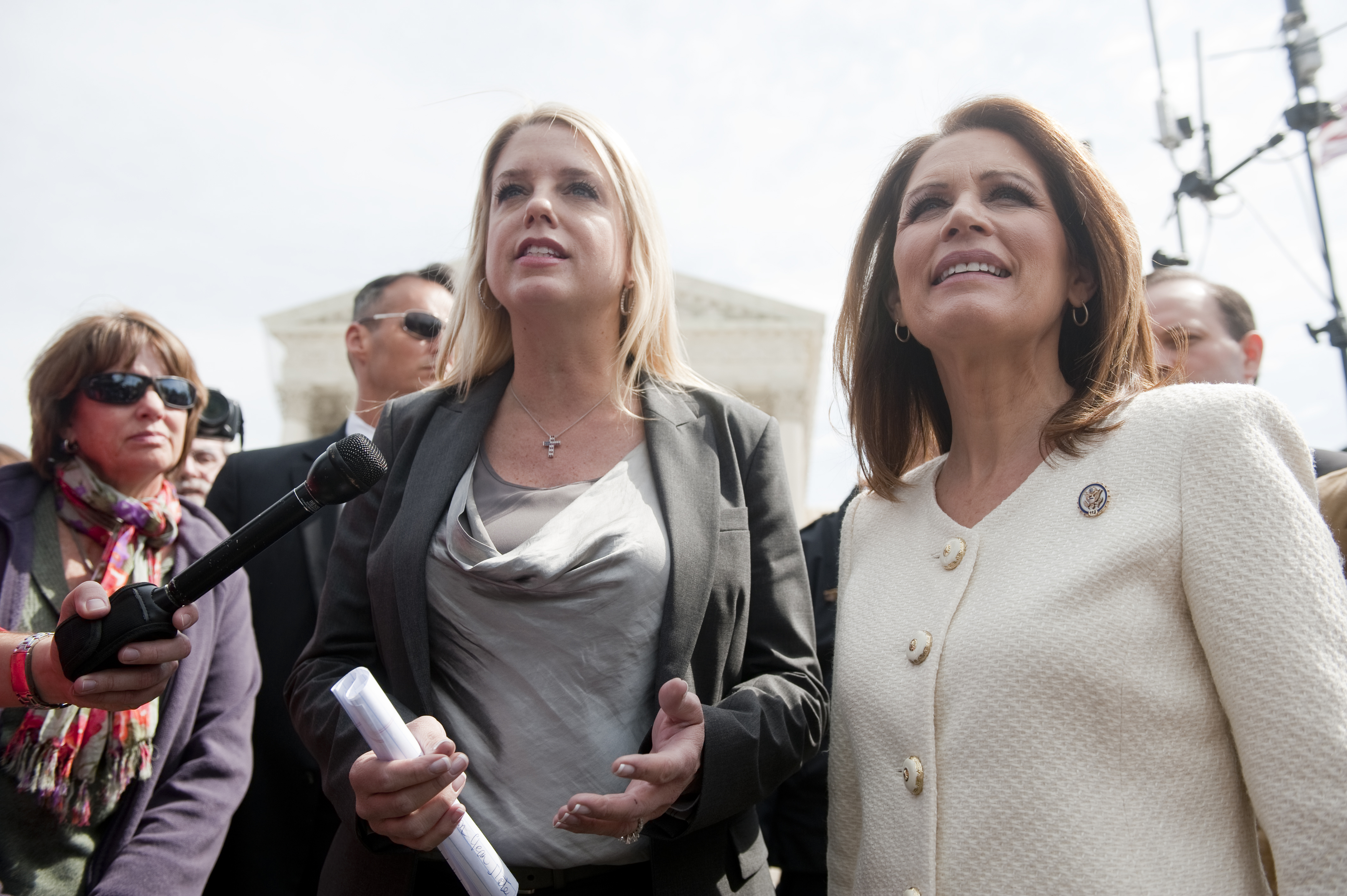 Then–Florida Attorney General Pam Bondi and Michele Bachmann speak outside the U.S. Supreme Court during Affordable Care Act arguments, Washington, D.C., March 28, 2012 | Source: Getty Images