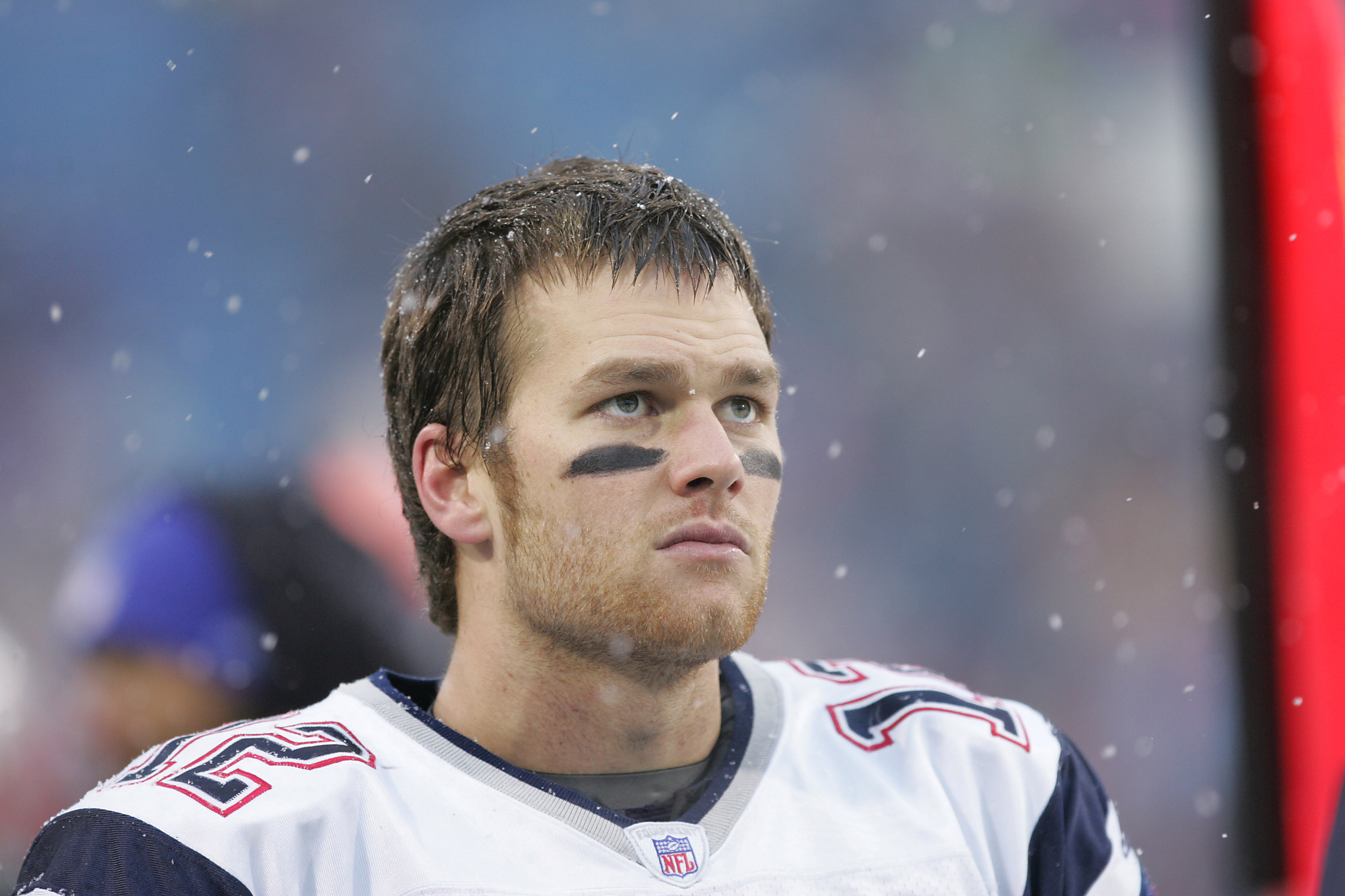 Tom Brady watched from the sidelines before the New England Patriots faced the Buffalo Bills at Ralph Wilson Stadium in Orchard Park, New York, on December 11, 2005. The close-up offered a detailed look at his facial structure during his playing days, years before cosmetic procedure rumors began circulating online and elsewhere.