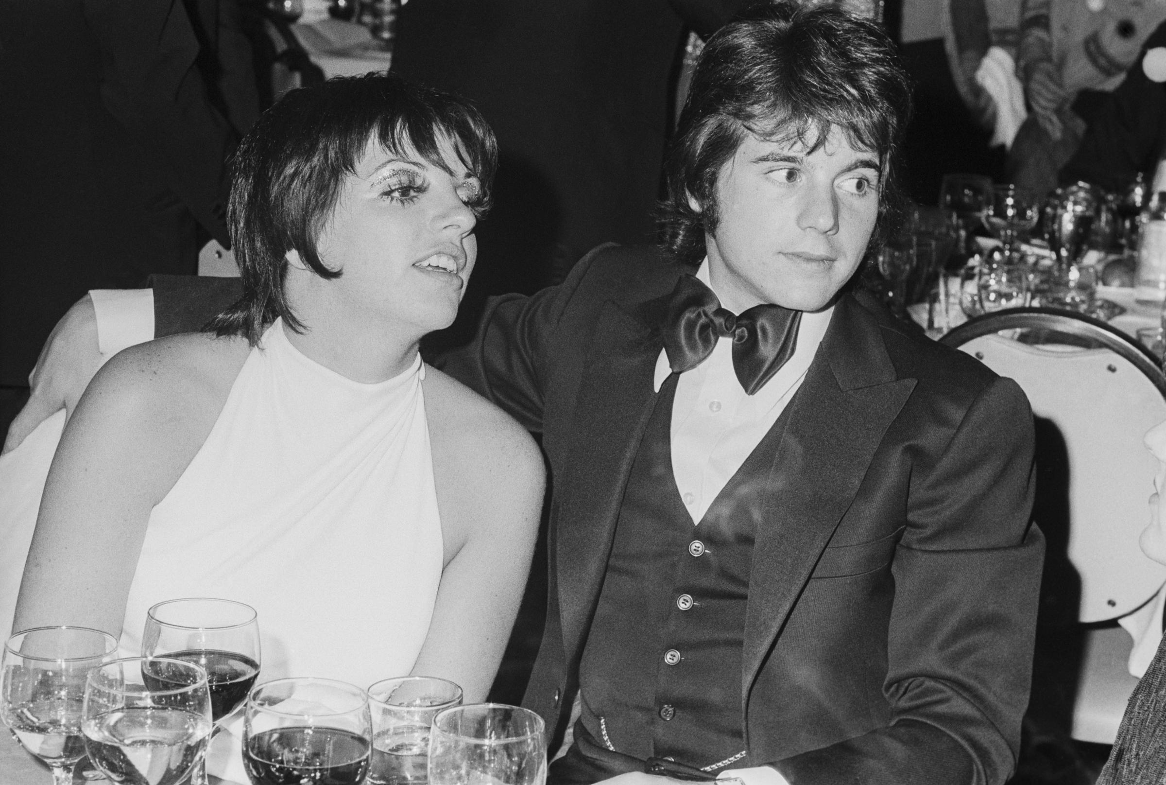 Desi Arnaz Jr. pictured with a friend, circa 1970 | Source: Getty Images