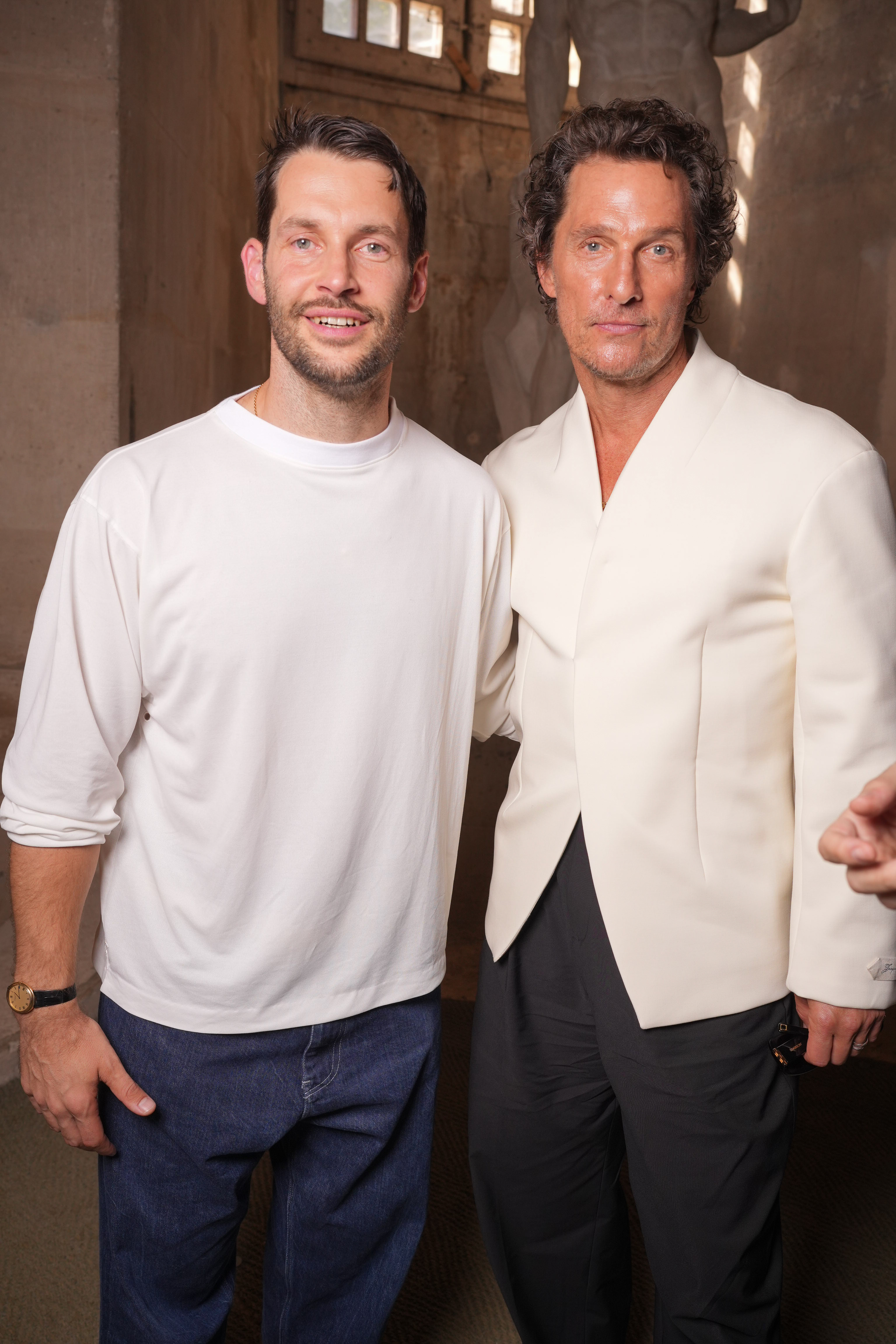 McConaughey poses with Simon Porte Jacquemus in a separate shot without Alves. By this point, McConaughey has removed his dark sunglasses, revealing eyes that radiate warmth. Standing beside him, Jacquemus offers a subtle smile, and there is a relaxed energy between the two.
