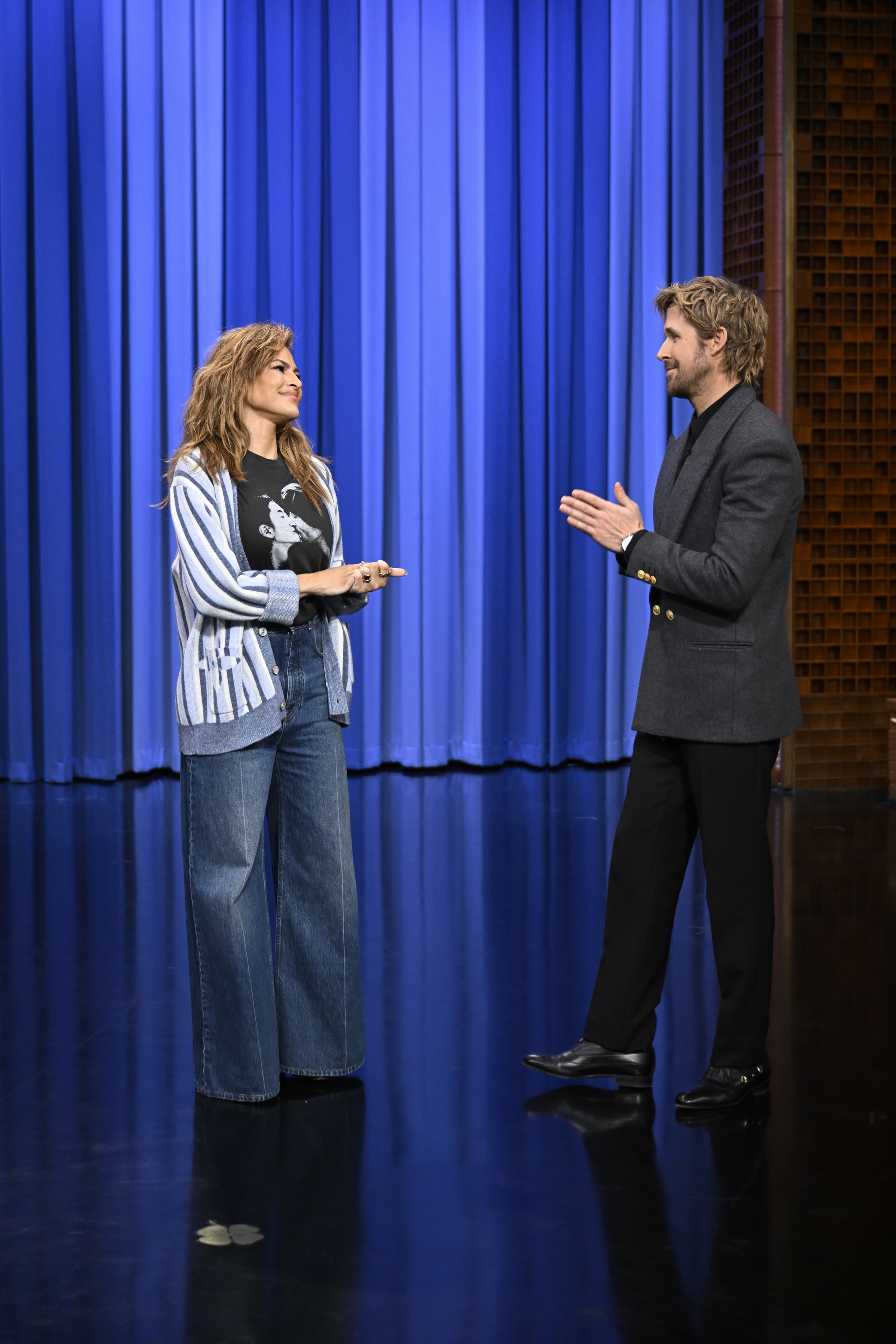 Eva Mendes and Ryan Gosling sharing a moment onstage at the show. | Source: Getty Images