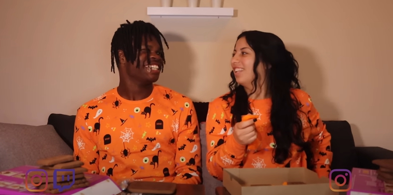 A screenshot of Travis Hunter and Leanna Lenee from a video dated October 21, 2022. | Source: YouTube/Travis and Leanna