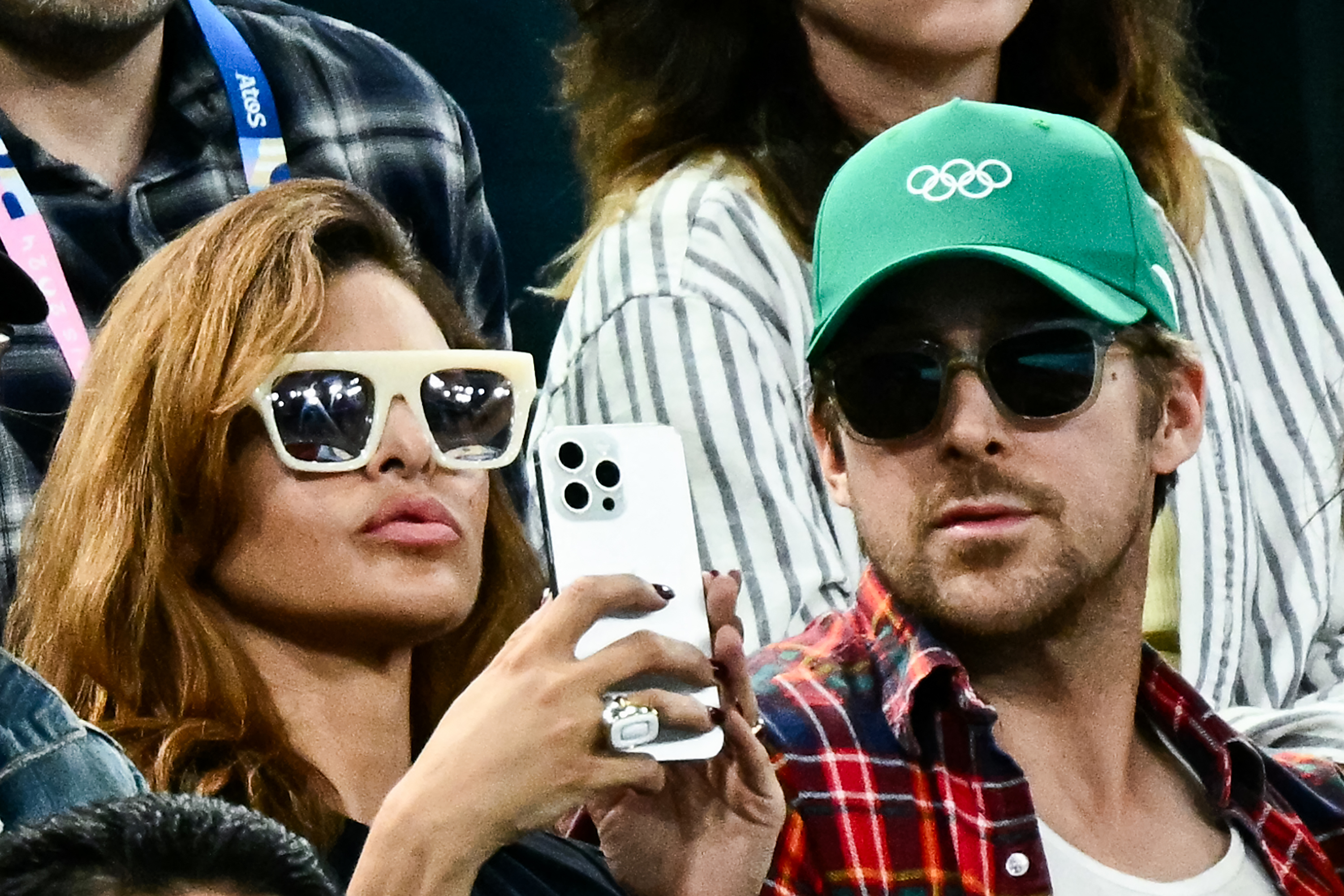 Eva Mendes and Ryan Gosling at the artistic gymnastics women's uneven bars final during the Paris 2024 Olympic Games on August 4, 2024, in France. | Source: Getty Images