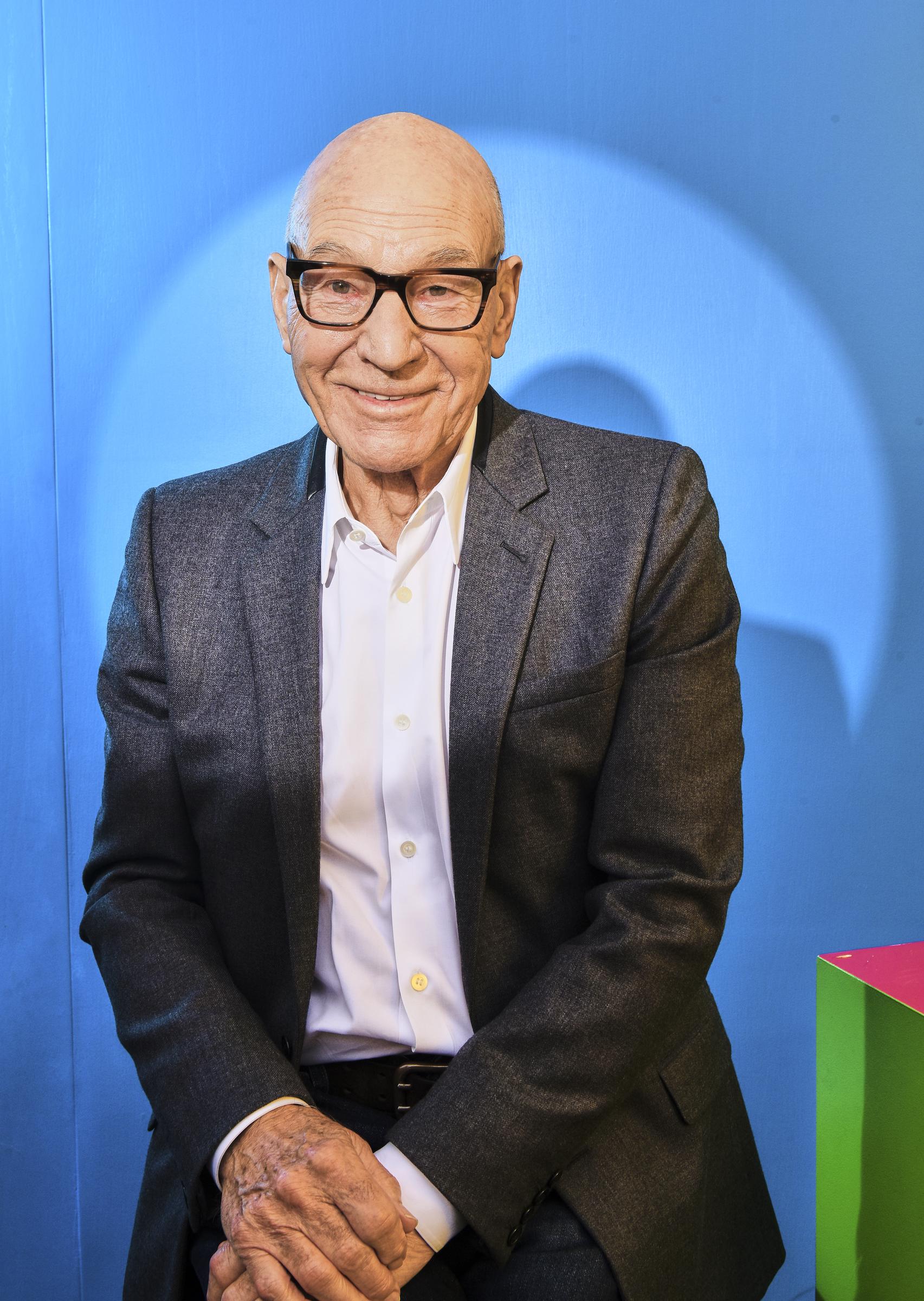 Patrick Stewart smiles for a portrait at San Diego Comic-Con in July 2022. Beyond his familiar roles in "Star Trek" and "X-Men," the actor also supported causes close to his heart, a side of his life highlighted in the Facebook tribute. | Source: Getty Images