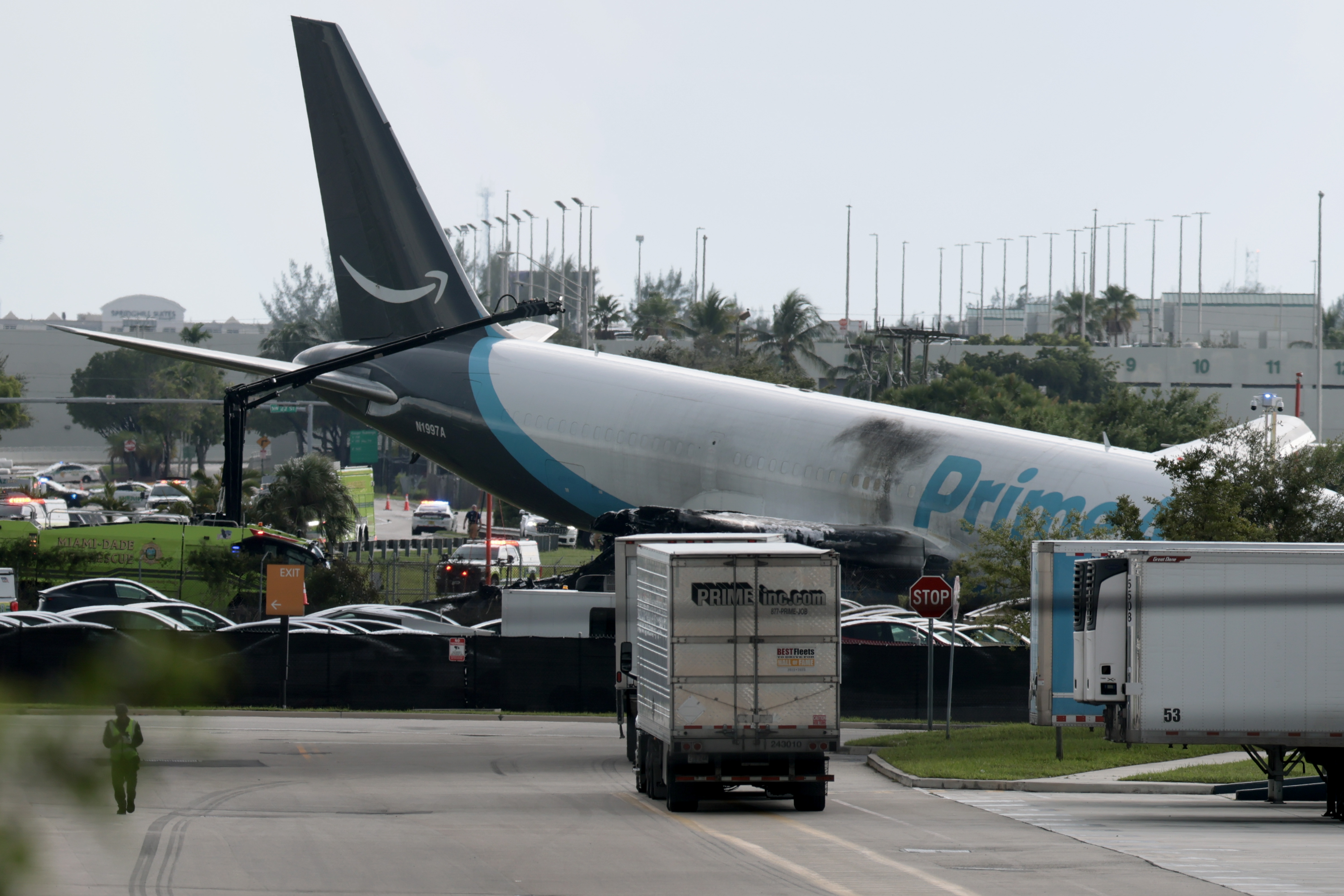 The Amazon Air cargo plane is seen disabled beyond the runway after Flight 7598 overran it while landing at Miami International Airport. The aircraft had arrived from San Juan before the crash triggered a major emergency response. | Source: Getty Images