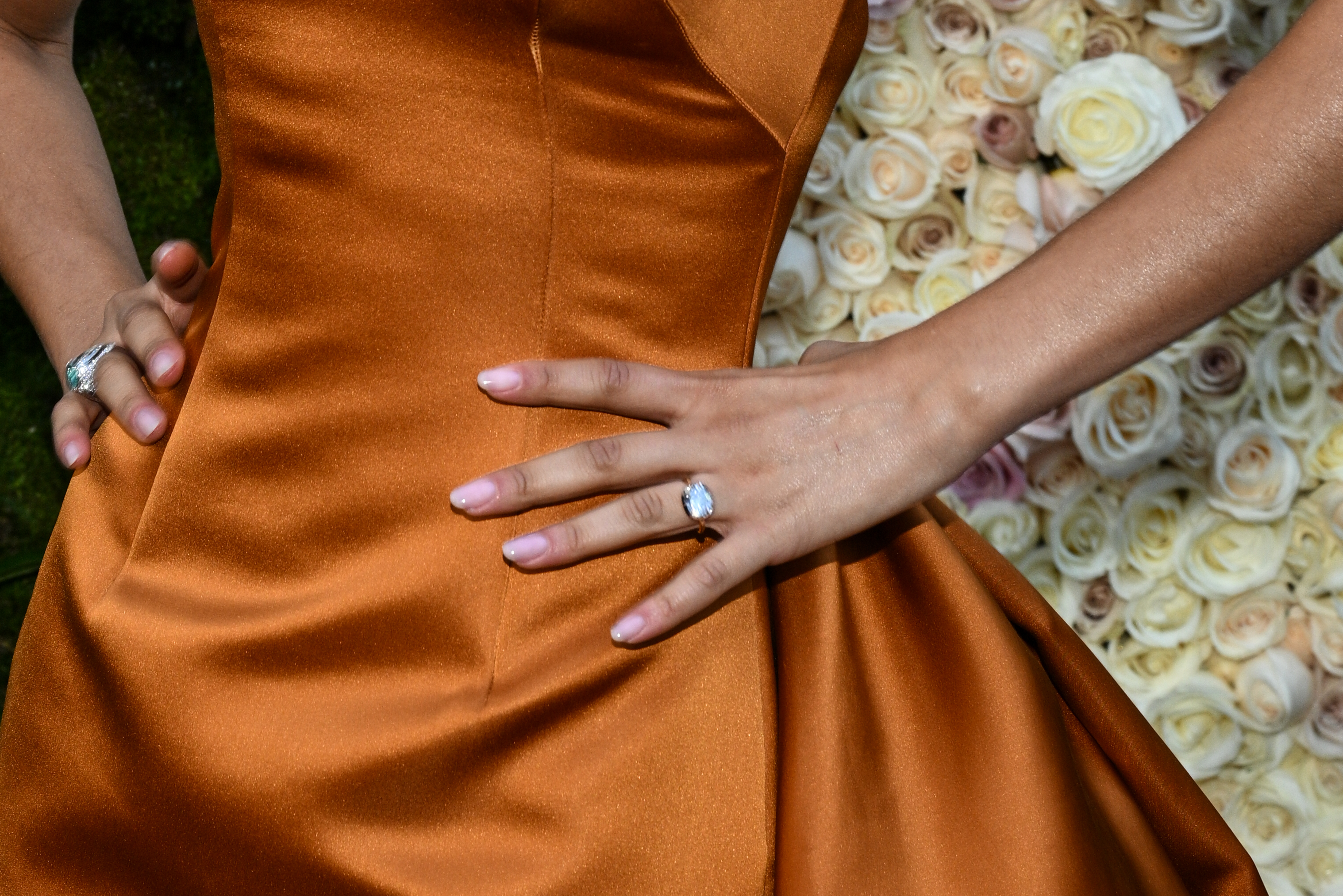 A detailed view of the ring set against her satin dress at the Beverly Hilton | Source: Getty Images