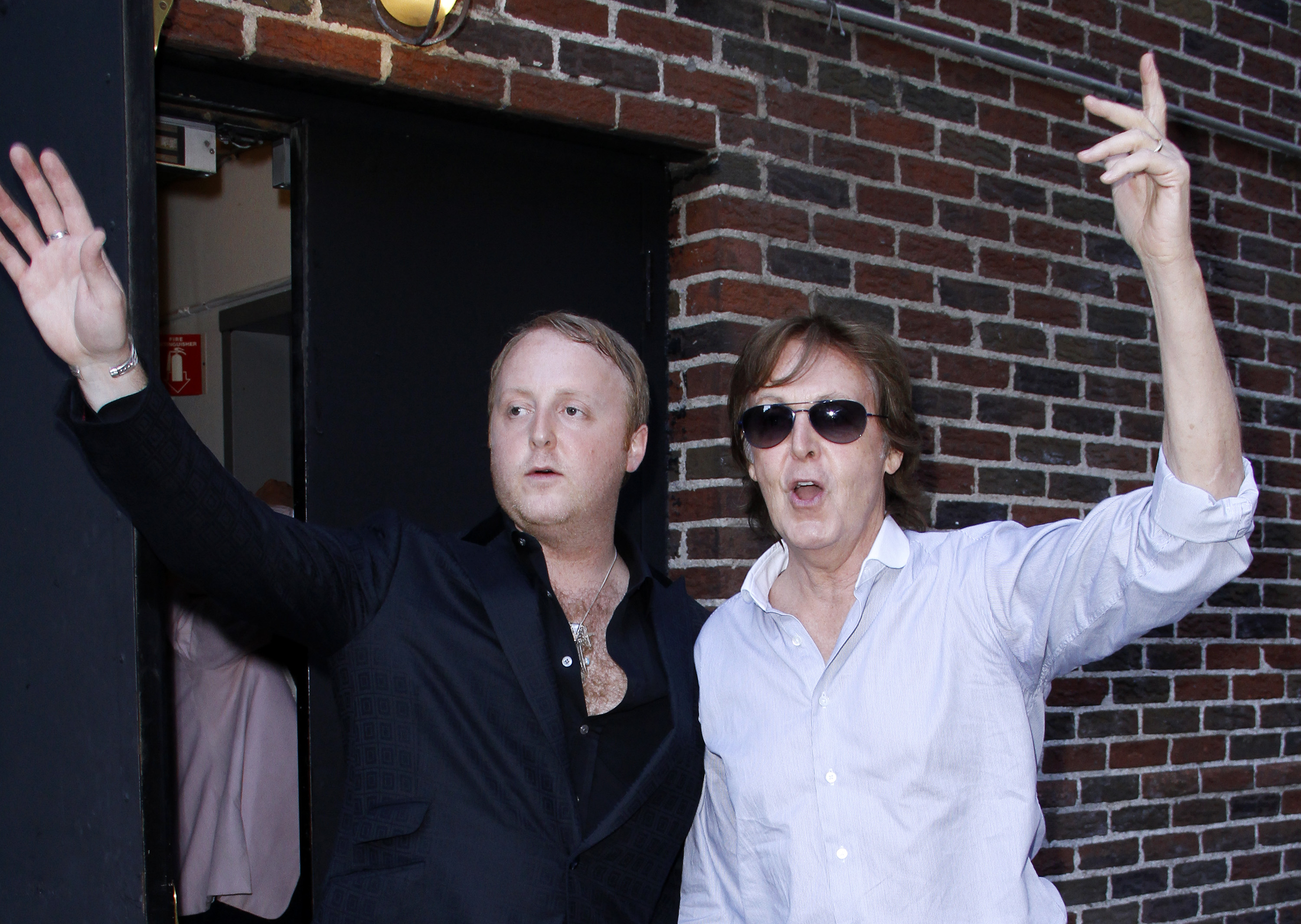 Paul McCartney and his son James outside the Ed Sullivan Theater after appearing on the ''Late Show with David Letterman'' in New York City on July 29, 2013 | Source: Getty Images