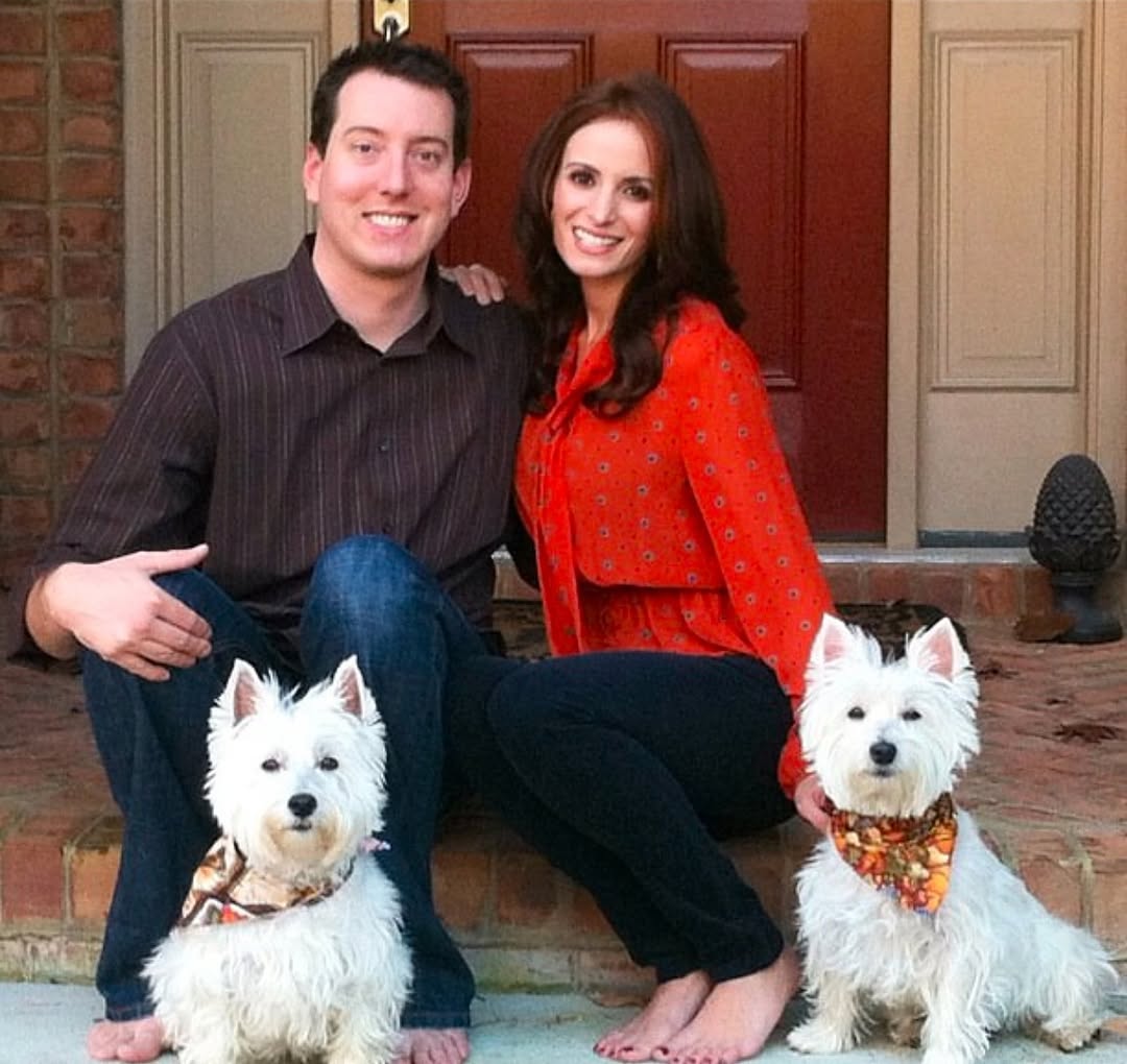 A throwback photo of Kyle and Samantha Busch with two dogs, posted on December 31, 2024. | Source: Instagram/rowdybusch