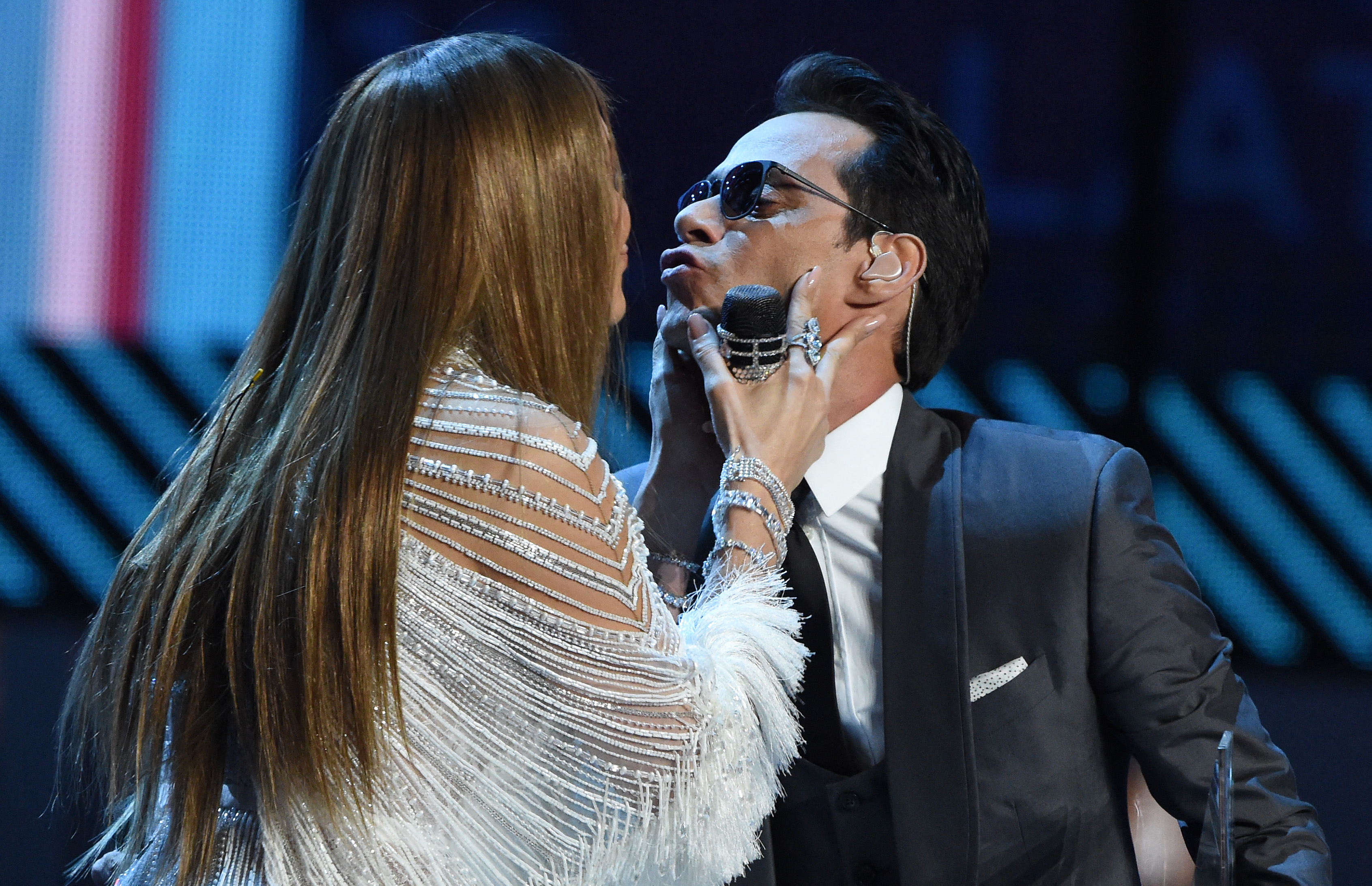 Jennifer Lopez and Marc Anthony's surprise kiss at the 2016 Latin Grammy Awards sparked excitement among fans, but both continued to describe their relationship as a close friendship after divorce. | Source: Getty Images