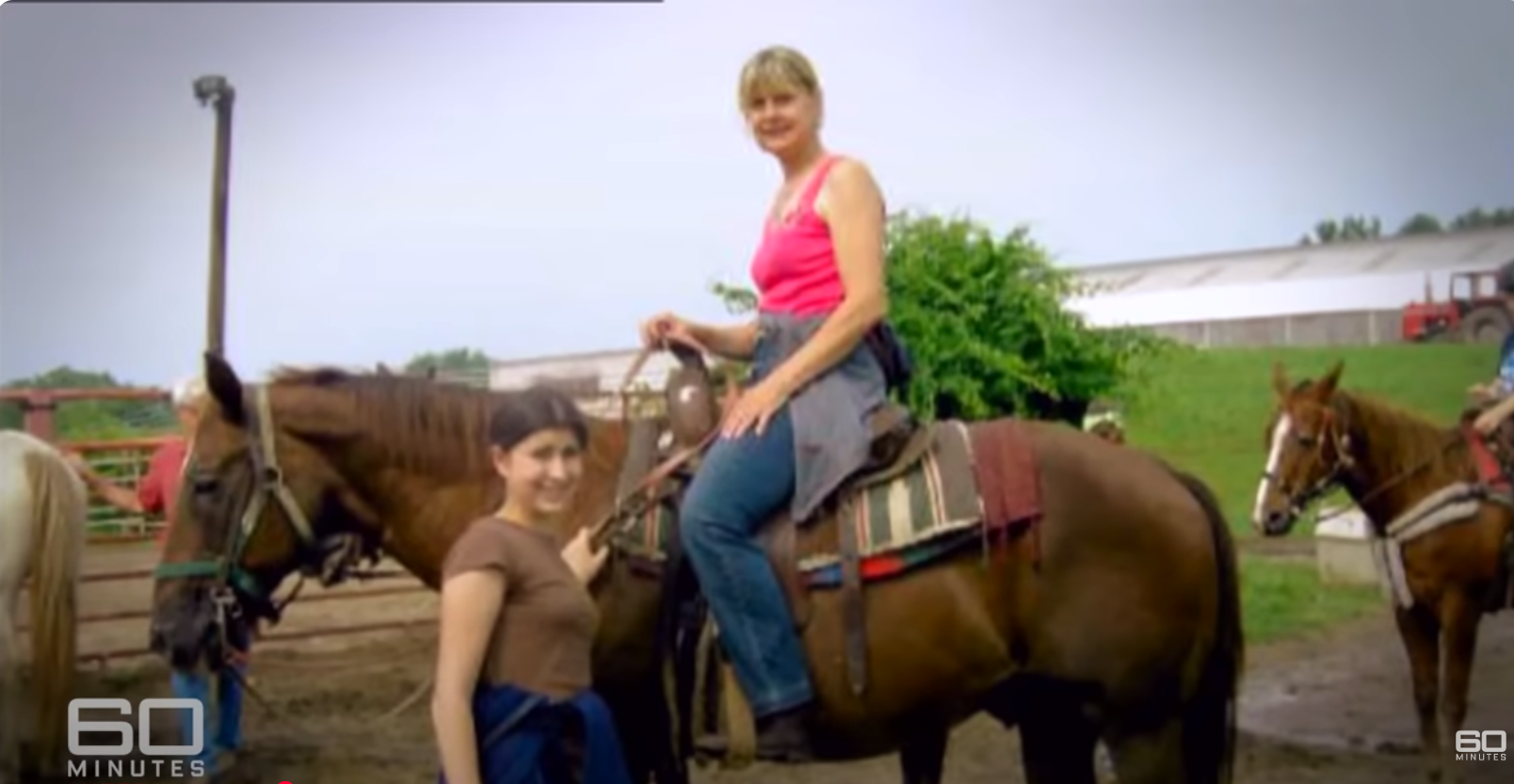 Charla Nash on a horse with her daughter standing beside her, dated June 11, 2025 | Source: YouTube/60MinutesAustralia