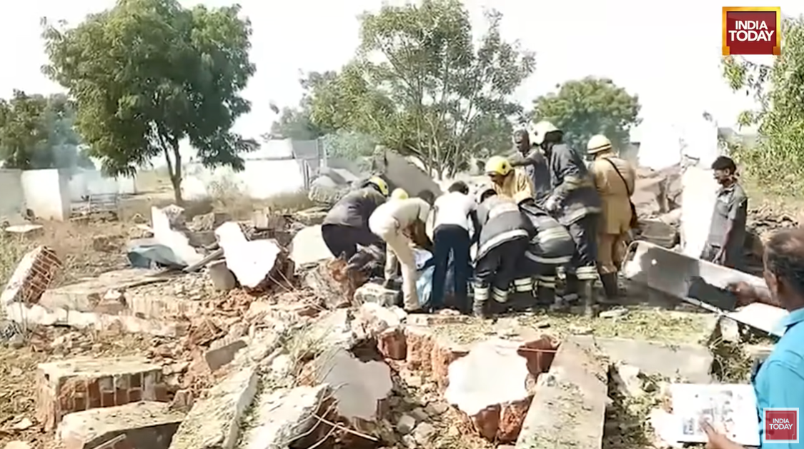 Rescue workers search through rubble at the site of the pharmaceutical plant blast, posted on July 1, 2025 | Source: YouTube/India Today