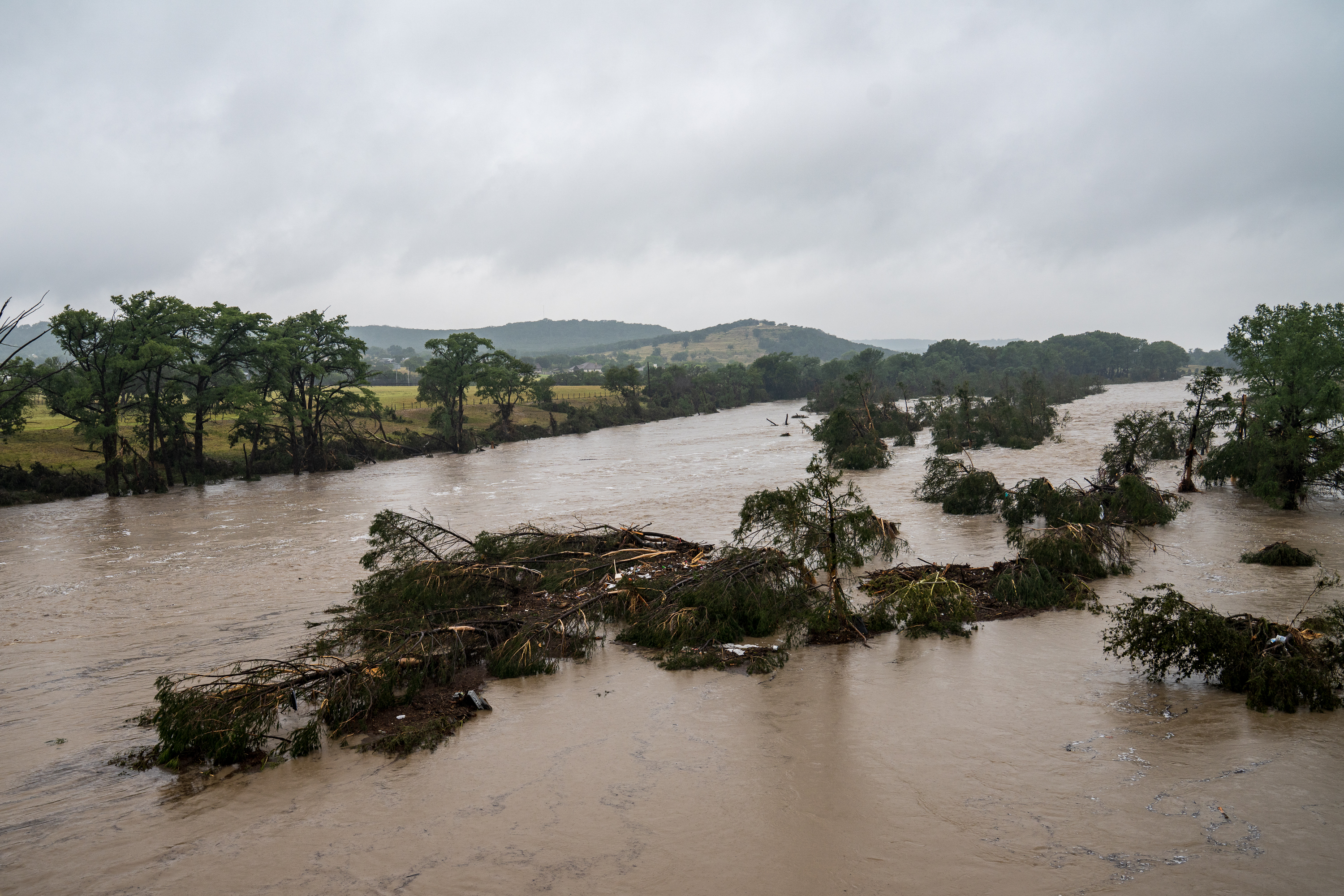 Trees taken down by the devastating floods in Kerrville, Texas on July 4, 2025. | Source: Getty Images