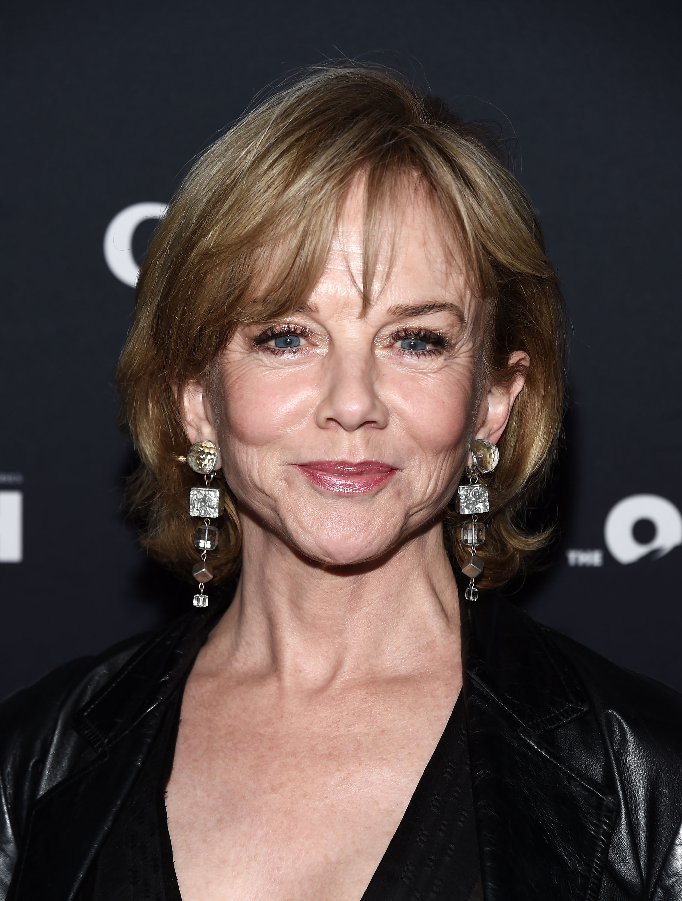 Arriving at Sony Pictures Studios for the March 7, 2018 premiere of "The Oath" in Culver City, California, a 62-year-old Linda Purl displayed a fully matured, distinguished beauty. Fine smile lines and delicate crow's feet lent character to her expressive face, which was framed by a feathered, honey-toned bob with wispy fringe and set off by bold, geometric drop earrings and a sleek black leather jacket.