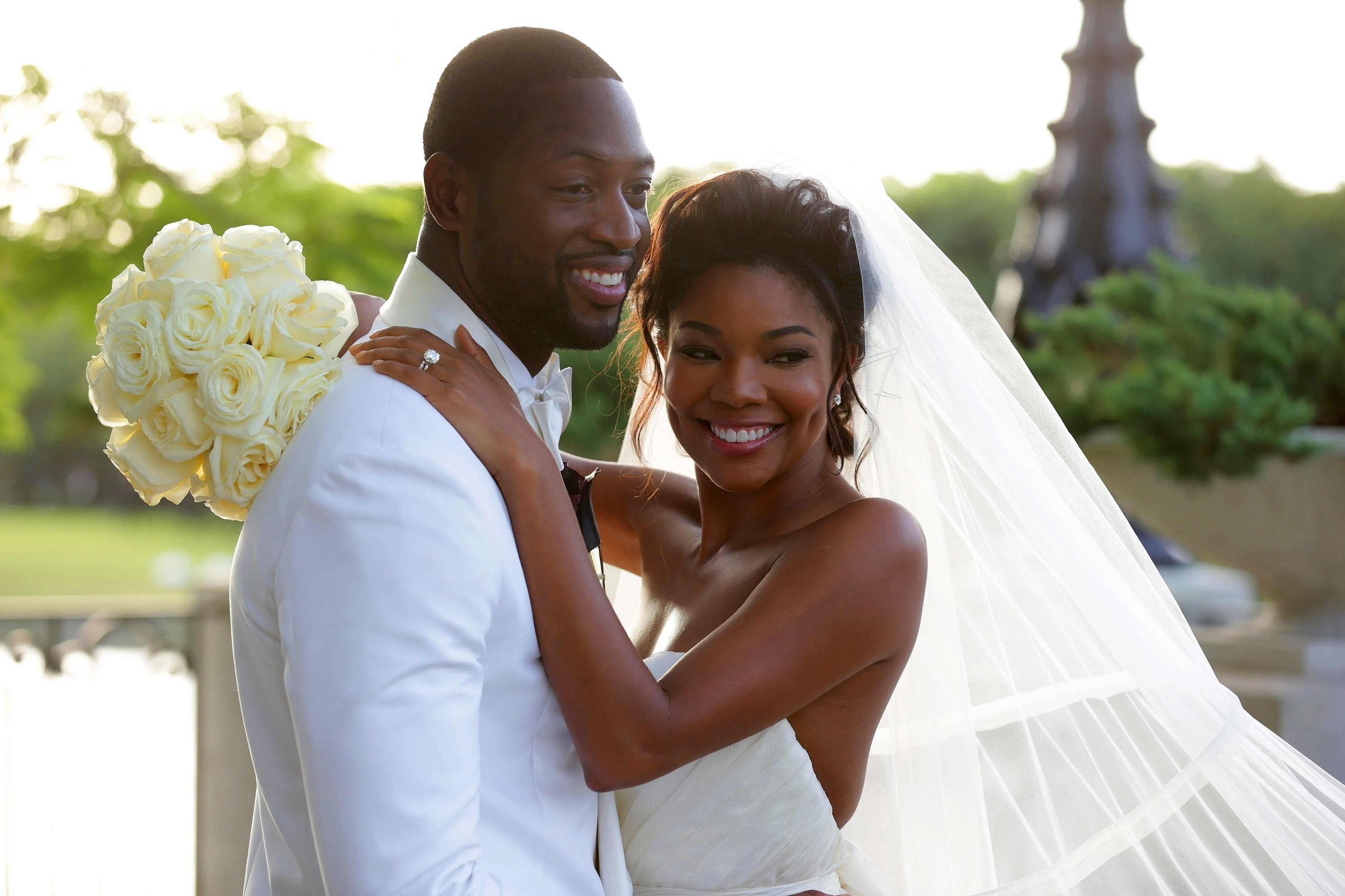 Dwyane Wade and Gabrielle Union posing in an official wedding portrait on August 30, 2014, in Miami, Florida. | Source: Getty Images