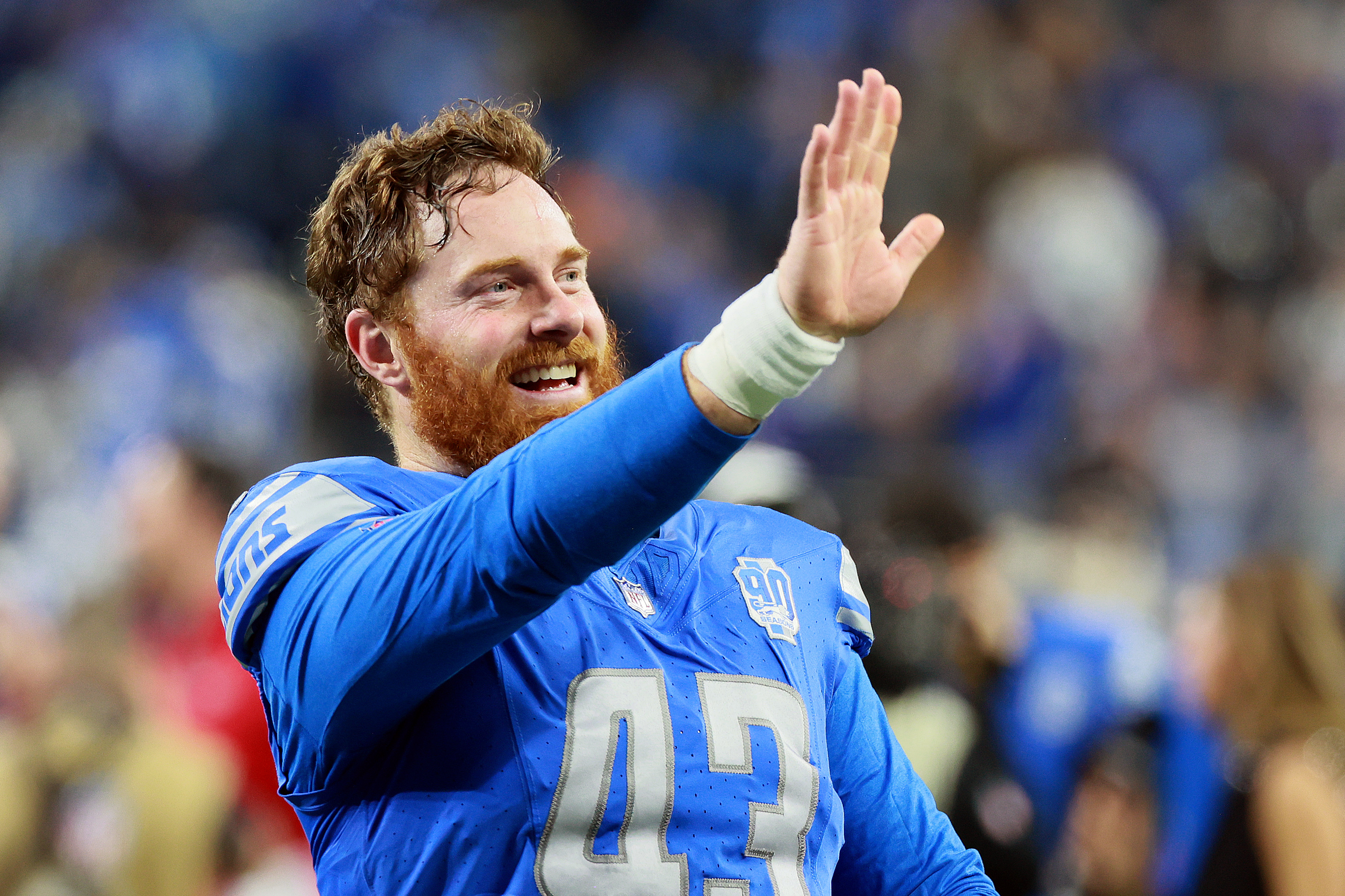 Jake McQuaide walks off the field in Detroit, Michigan on January 21, 2024 | Source: Getty Images