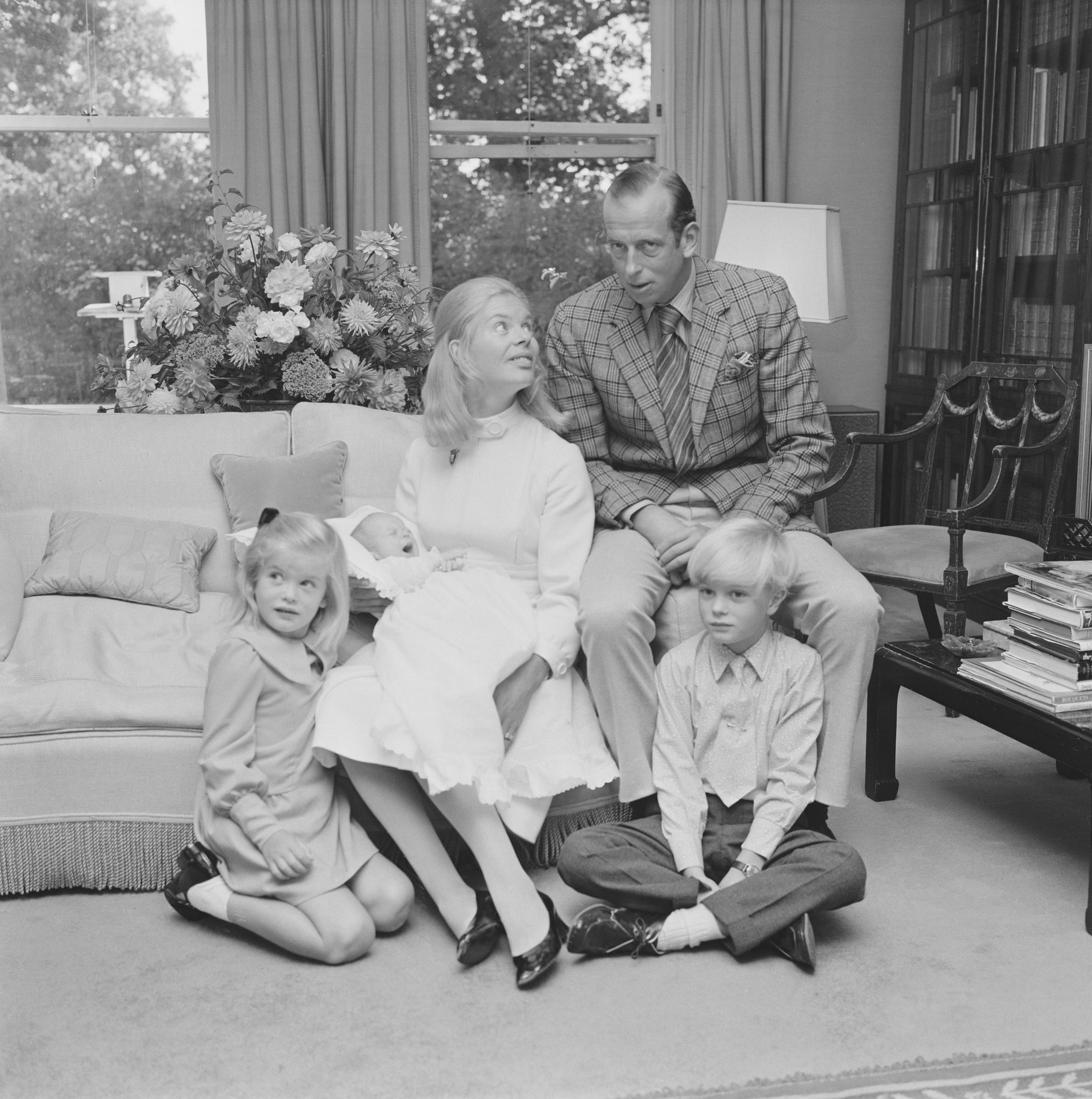 Prince Edward, Duke of Kent and Katharine, Duchess of Kent pose with their children George Windsor, Helen Windsor (now Lady Helen Taylor) and baby son Nicholas Windsor at home on September 10, 1970, in London, England. | Source: Getty Images
