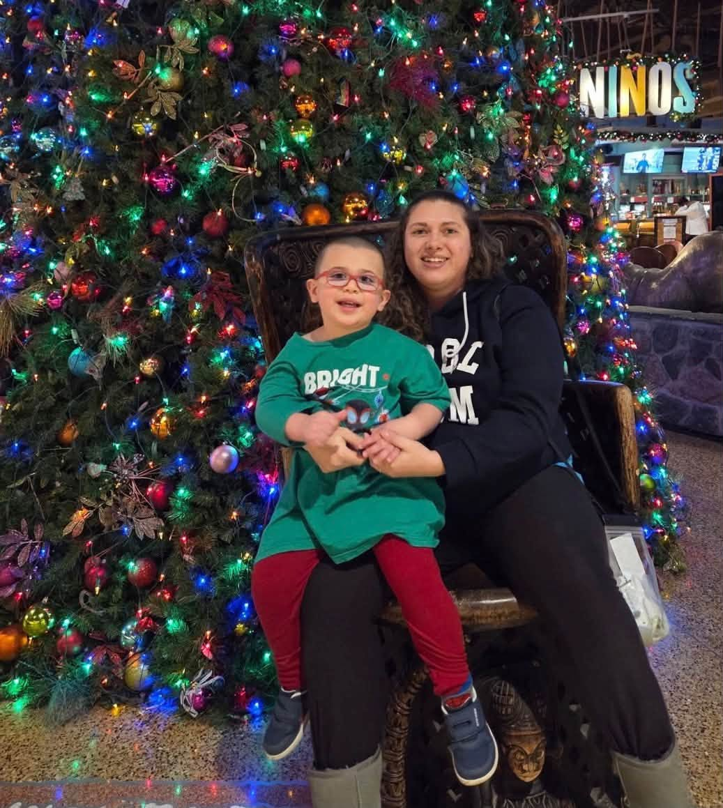 Metallica Rose Harrison shares a festive moment with her young son in front of a brightly decorated Christmas tree, a cheerful family memory now overshadowed by the heartbreaking deaths. | Source: Facebook/TrueCrimeMama