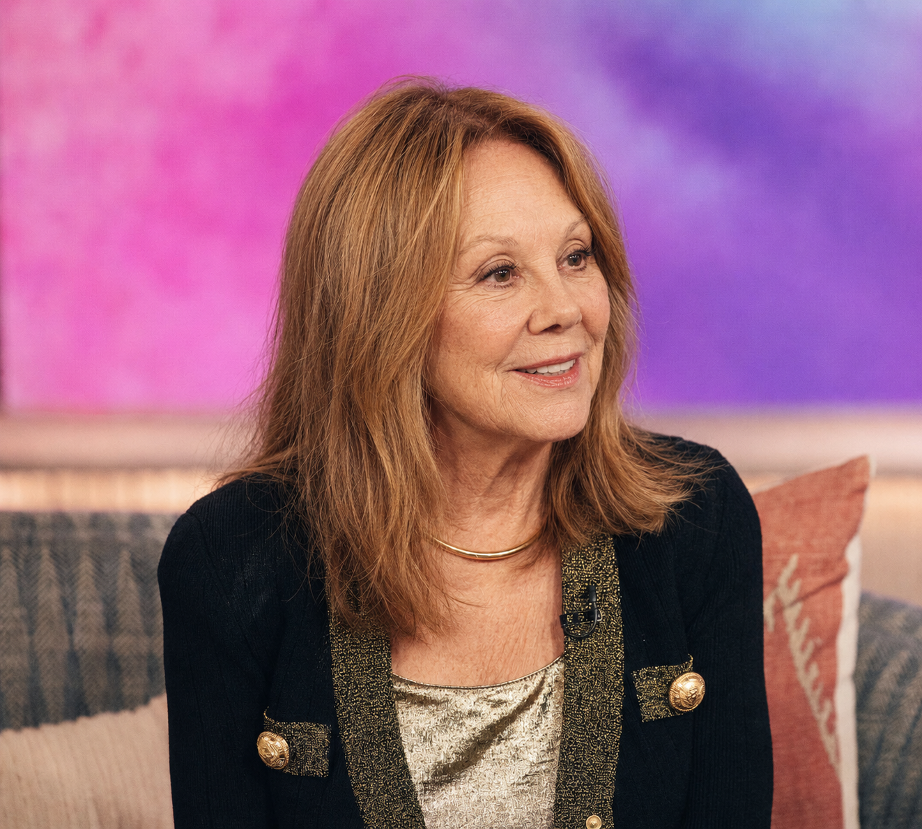 Marlo Thomas appears in an AI-generated studio portrait wearing a black jacket with gold accents over a metallic top. | Source: ChatGPT