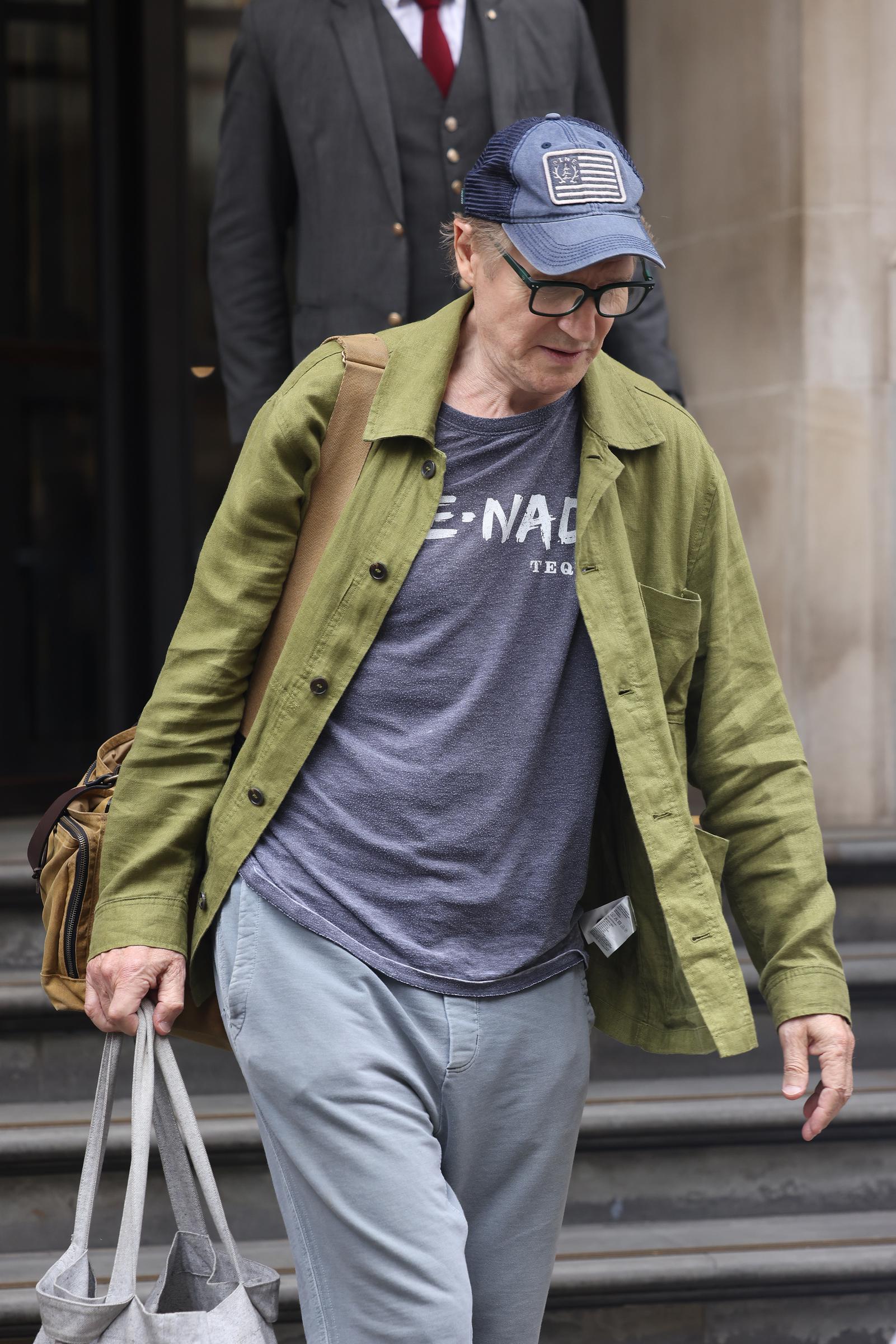 Liam Neeson leaves the Corinthia Hotel in London, England, on July 23, 2025 | Source: Getty Images