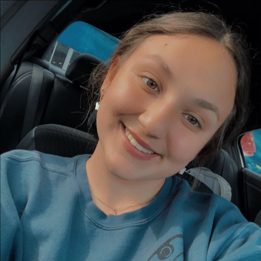 Katie McCormack flashes a bright smile while taking a casual selfie inside a car. Investigators continue working to reconstruct Nolan’s movements during his final hours on Horn Island. | Source: Facebook/Katie McCormack