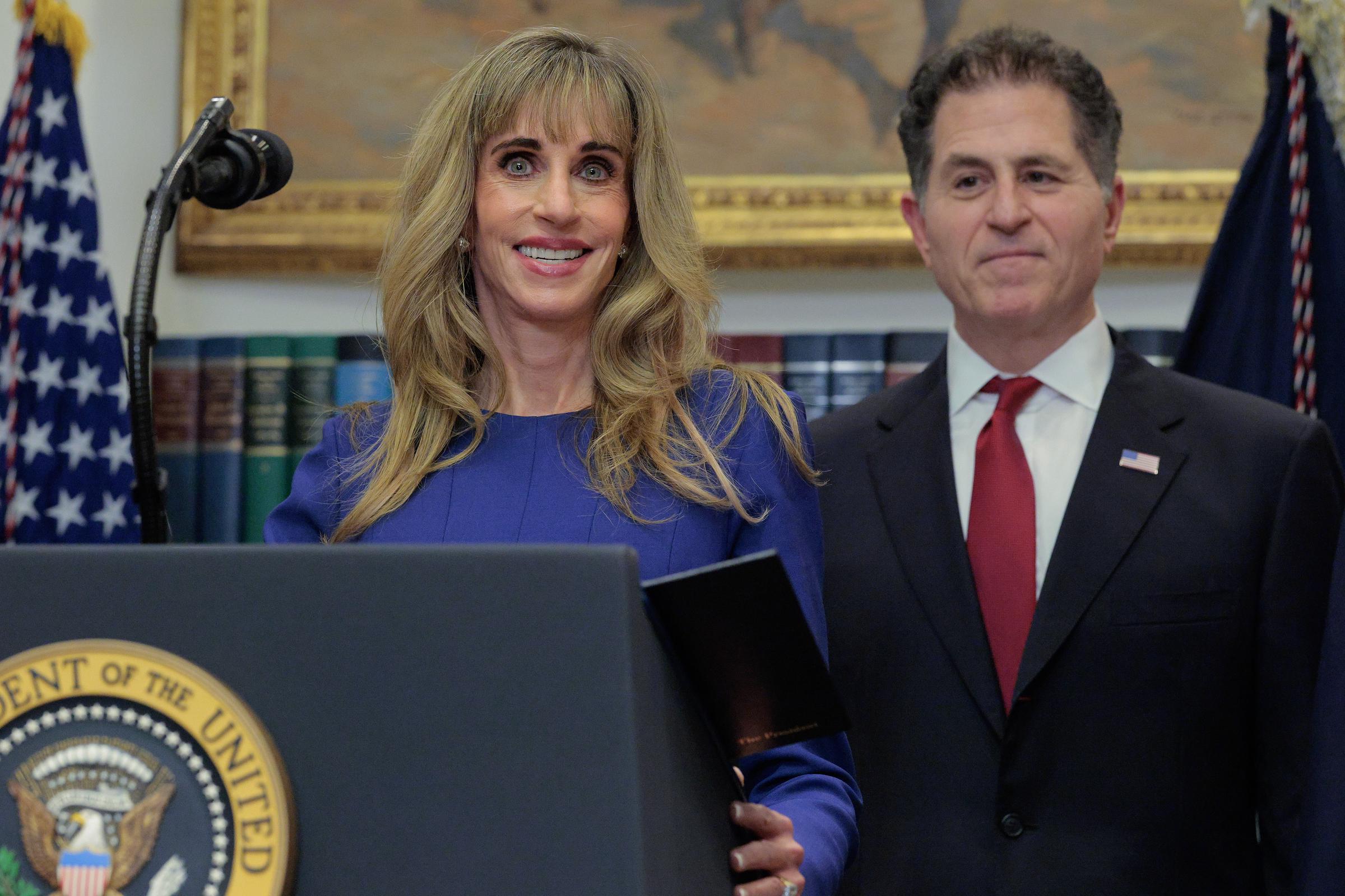 Michael and Susan Dell appeared together at the White House in December 2025 as their family announced a $6.25 billion commitment to help fund investment accounts for American children. | Source: Getty Images.