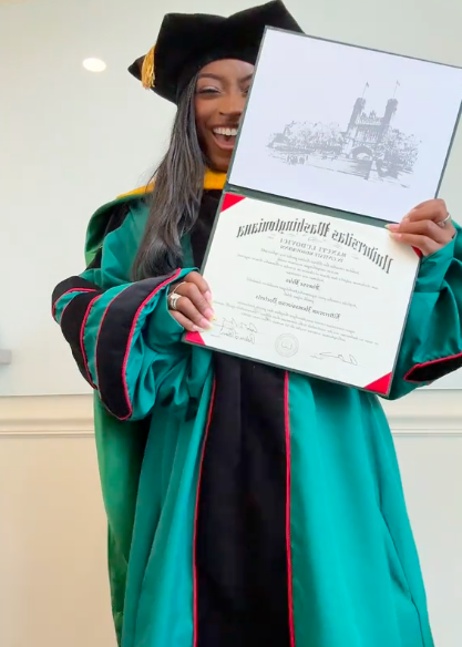 Simone Biles showing her honorary degree from Washington University. | Source: TikTok/@simonebilesowens