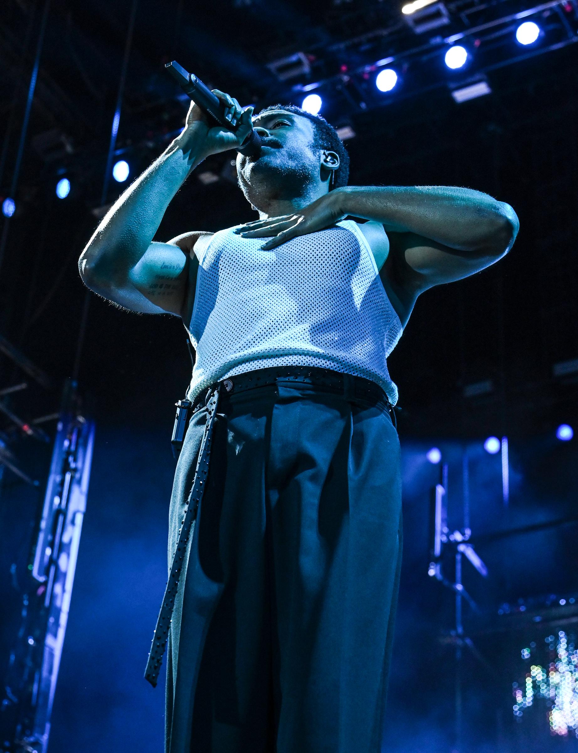 Donald Glover performs under the lights during Camp Flog Gnaw 2025 | Source: Getty Images