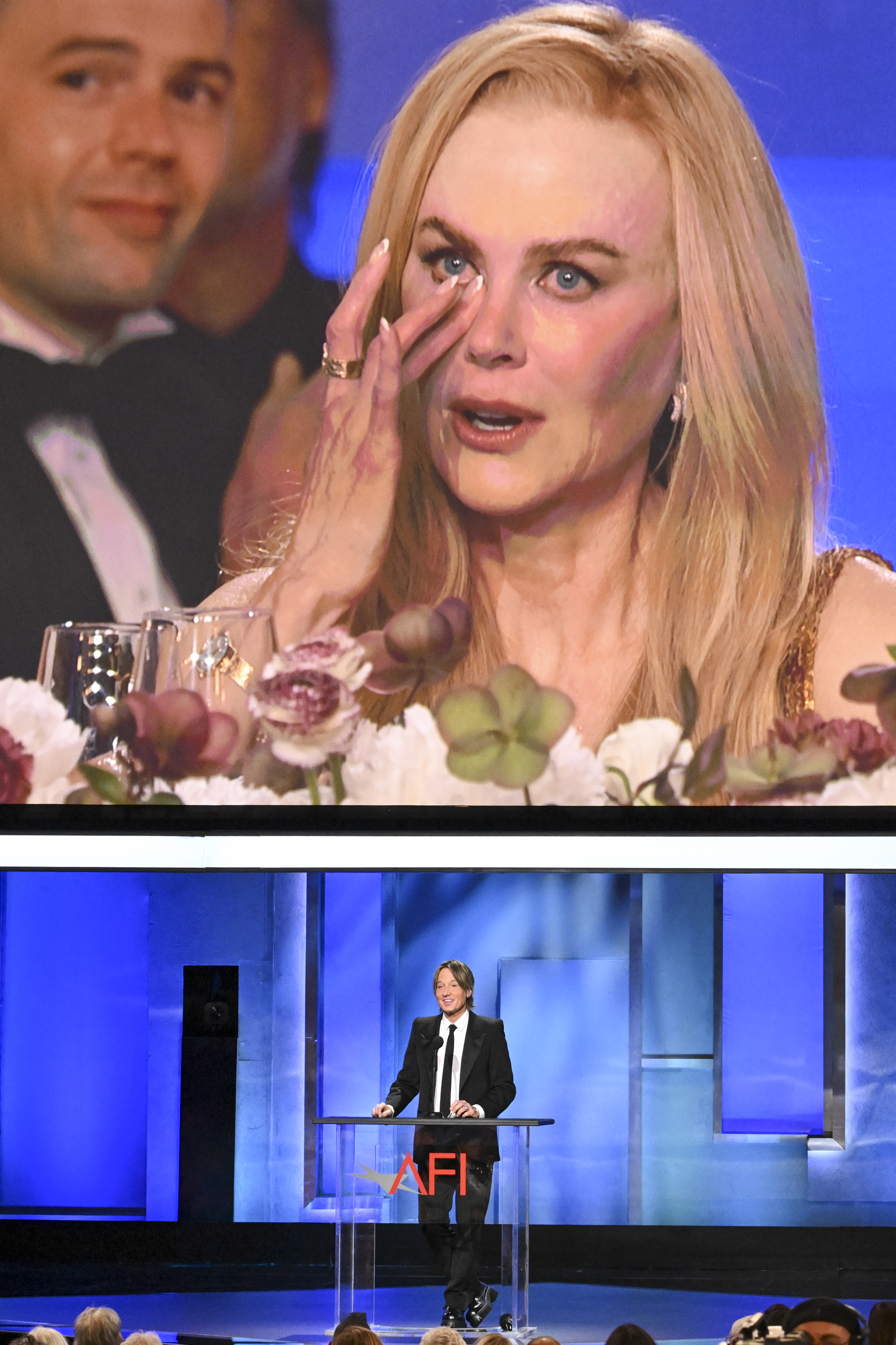 Nicole Kidman on screen as Keith Urban speaks onstage at the AFI Life Achievement Award Honoring her on April 27, 2024, in Los Angeles, California. | Source: Getty Images
