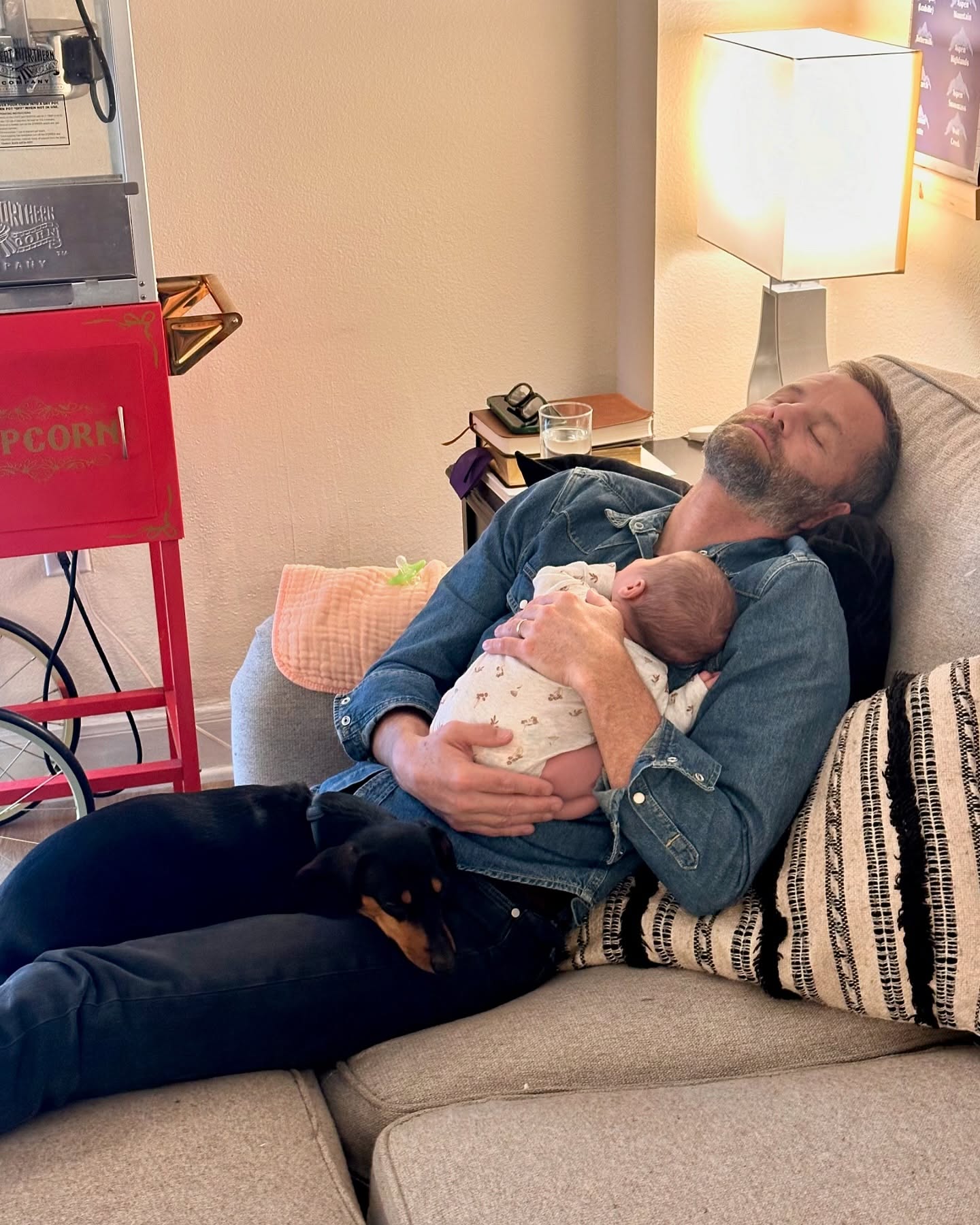 Kirk Cameron cuddles his granddaughter, from a post dated September 3, 2024 | Source: Facebook/kirkcameron