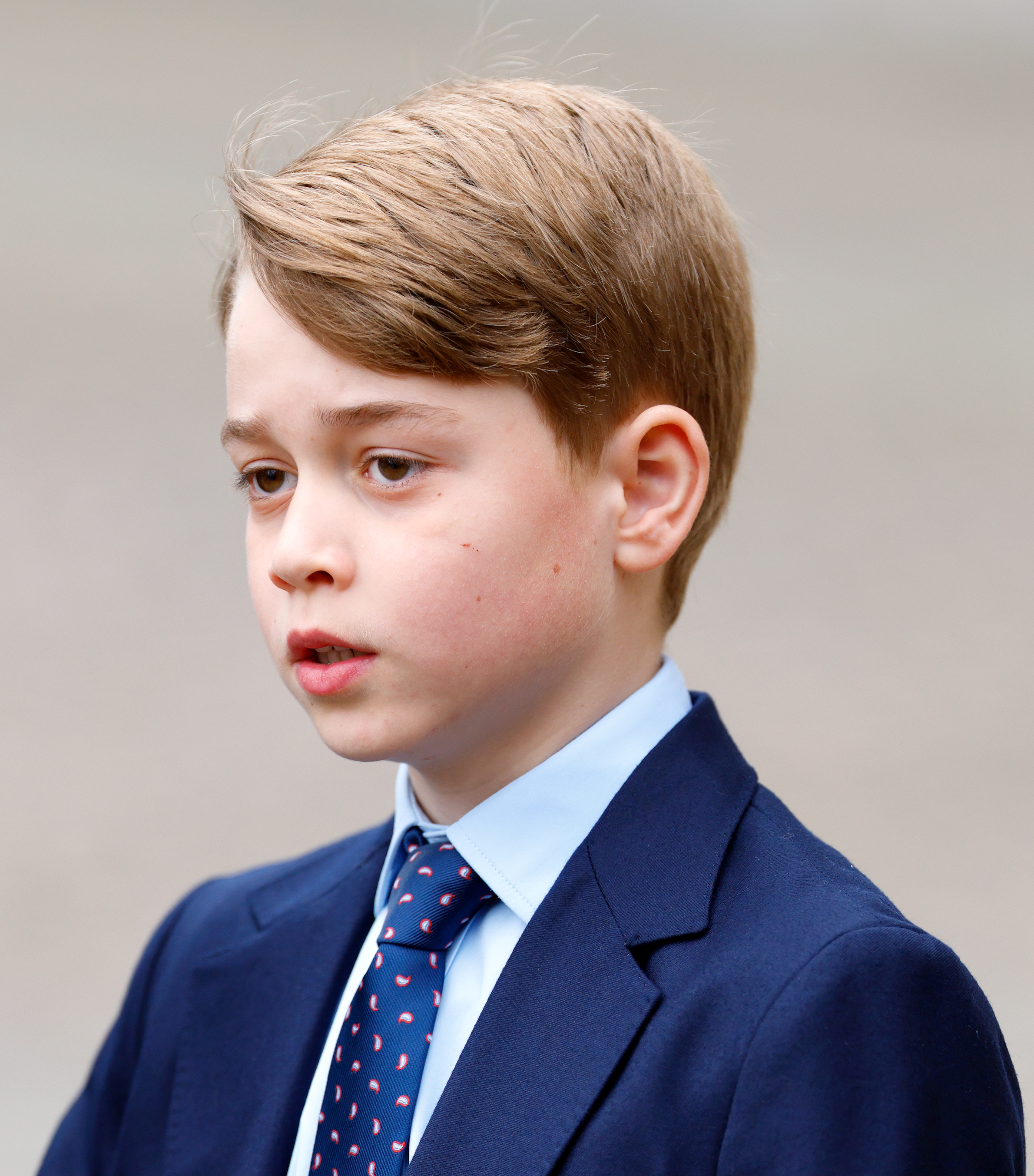 George's public appearances took on a more solemn tone when he attended the Service of Thanksgiving for his late great-grandfather, Prince Philip, at Westminster Abbey on March 29, 2022. Dressed in a navy suit and tie, he was nearing 9 as his role at major royal family occasions became more visible.