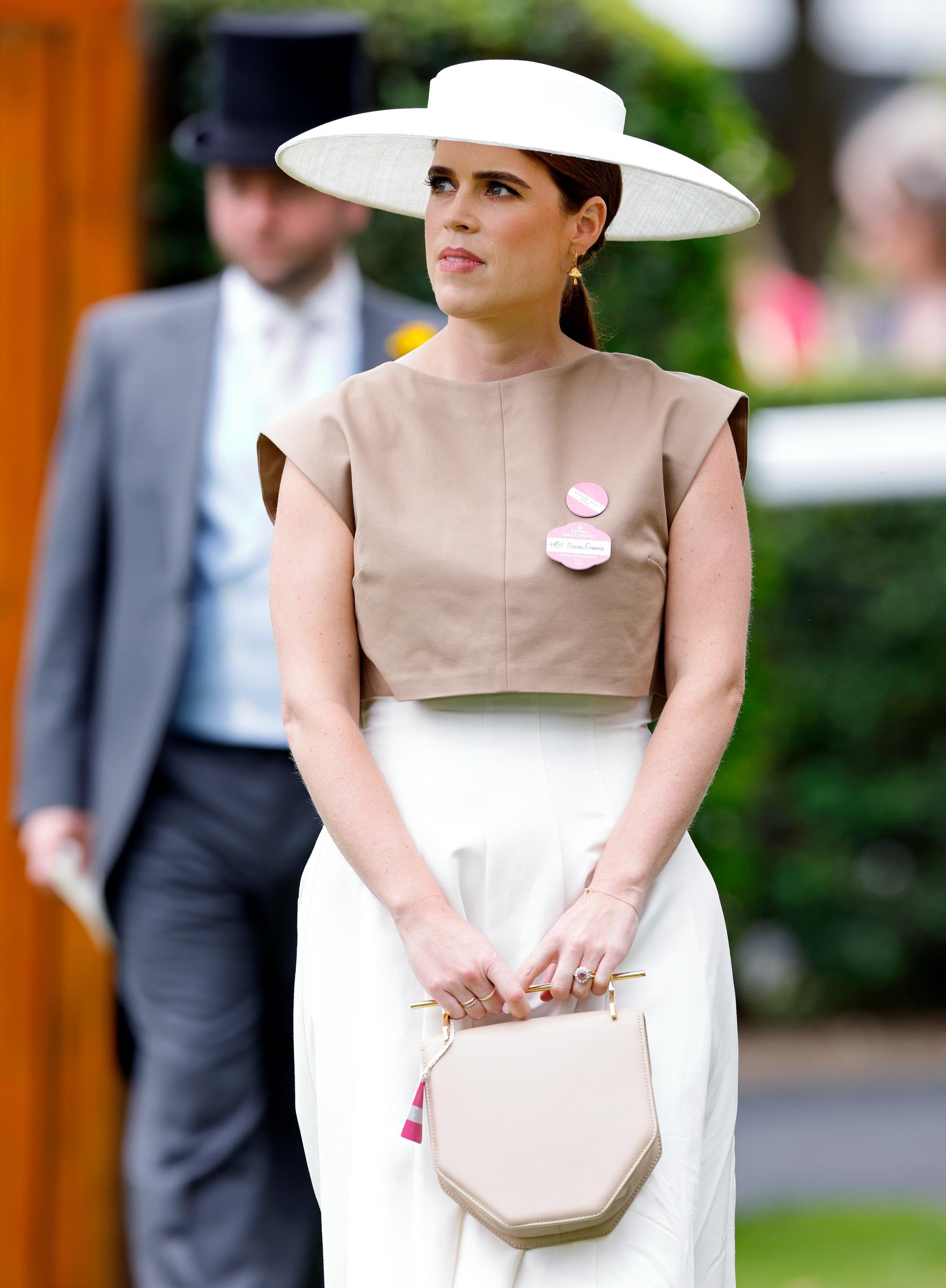 By the mid-2020s, Eugenie was being associated with cleaner silhouettes and more deliberately pared-back styling. Her wardrobe transformation became significant enough to spark comparisons with Meghan Markle's understated approach to royal fashion.