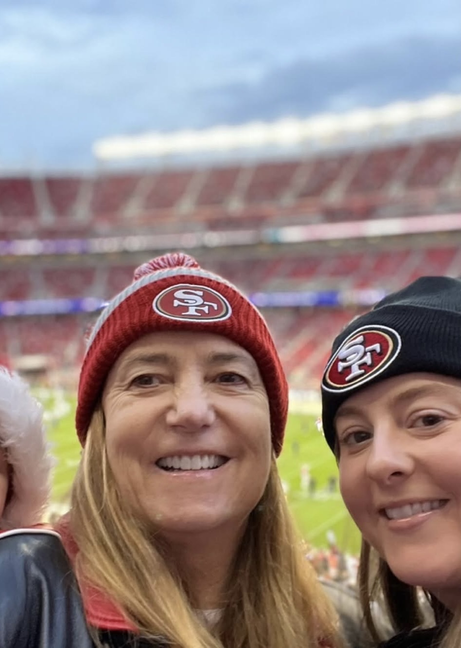 A cheerful selfie captures a mother-and-daughter moment at Levi’s Stadium, with both wearing San Francisco 49ers hats. The stadium in Santa Clara has been the team's home since 2014. | Source: Facebook/@katie.mannix.5
