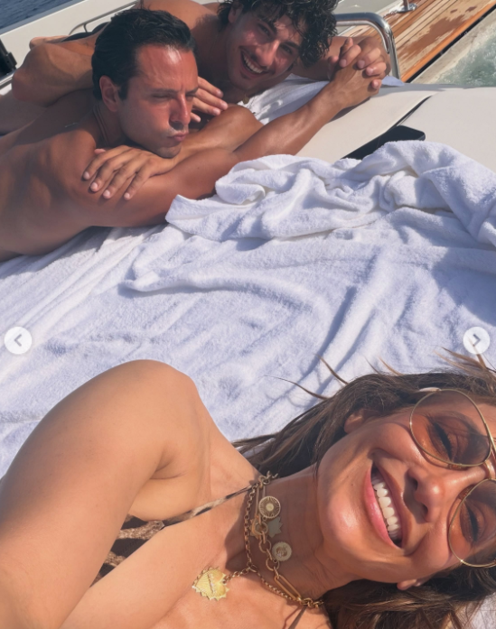 A smiling yacht selfie captured one of the getaway's more relaxed moments, with friends lounging behind Jennifer in the sun. The photo contrasted with the polished evening looks featured elsewhere in the carousel. | Source: Instagram/jlo