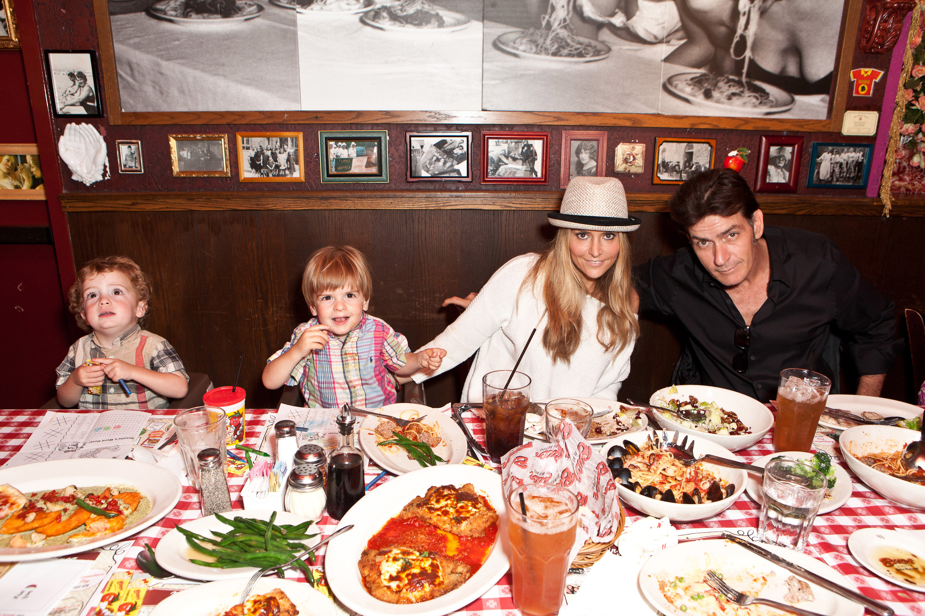 Brooke Mueller and Charlie Sheen with their twin sons, Bob and Max Sheen, at Charlie's birthday celebration in Encino, California on September 3, 2011
