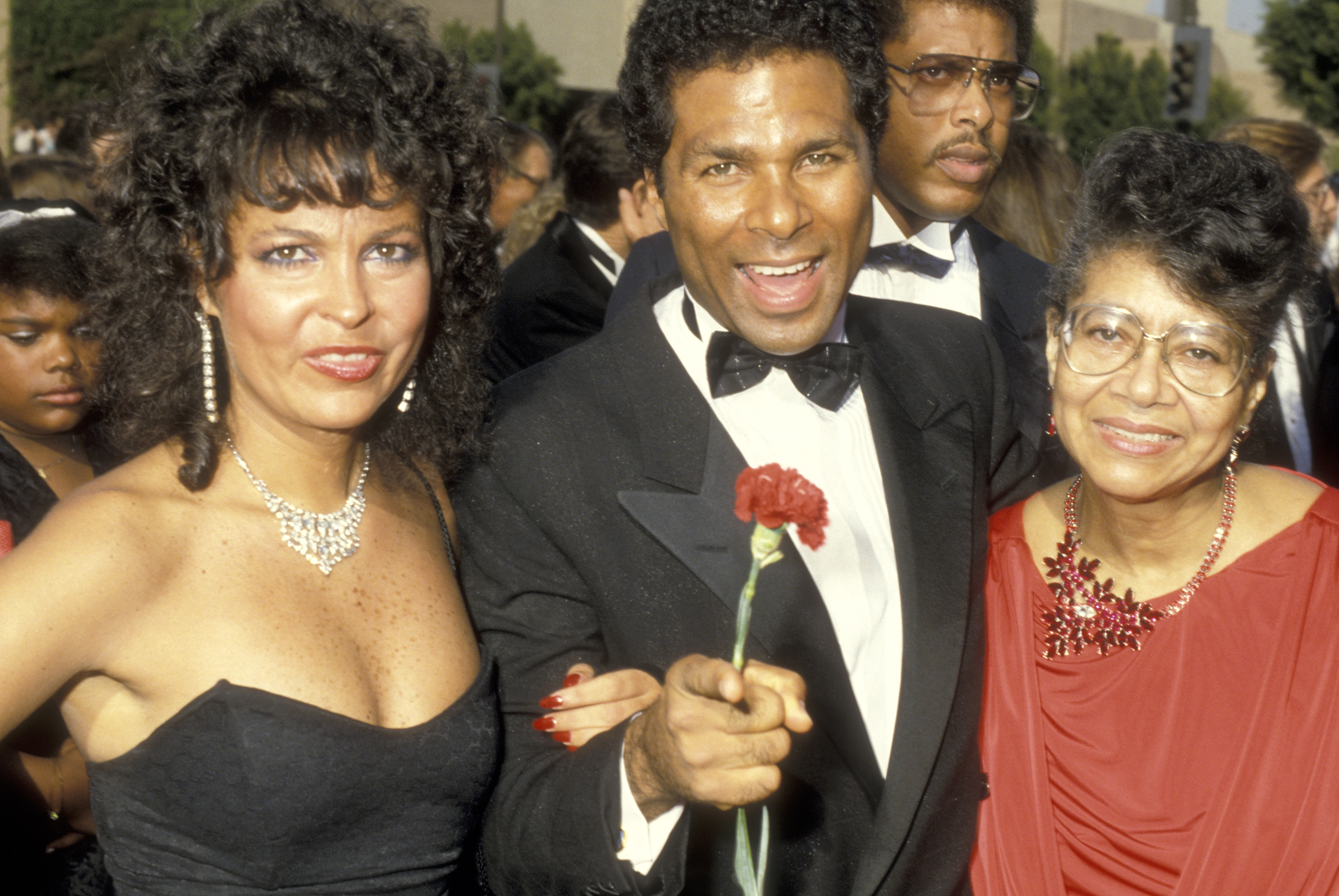 Philip Michael Thomas, then-girlfriend Dhaima Matthews, and mother Lulu McMorris attend the 38th Annual Primetime Emmy Awards on September 21, 1986 | Source: Getty Images