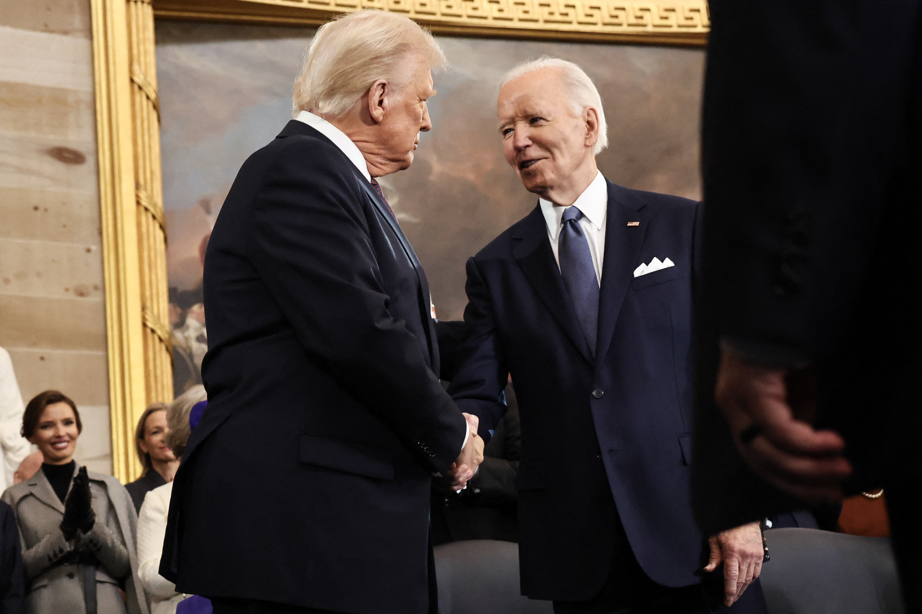 U.S. President Donald Trump shaking hands with former U.S. President Joe Biden during the inauguration ceremonies in Washington, D.C., on January 20, 2025 | Source: Getty Images