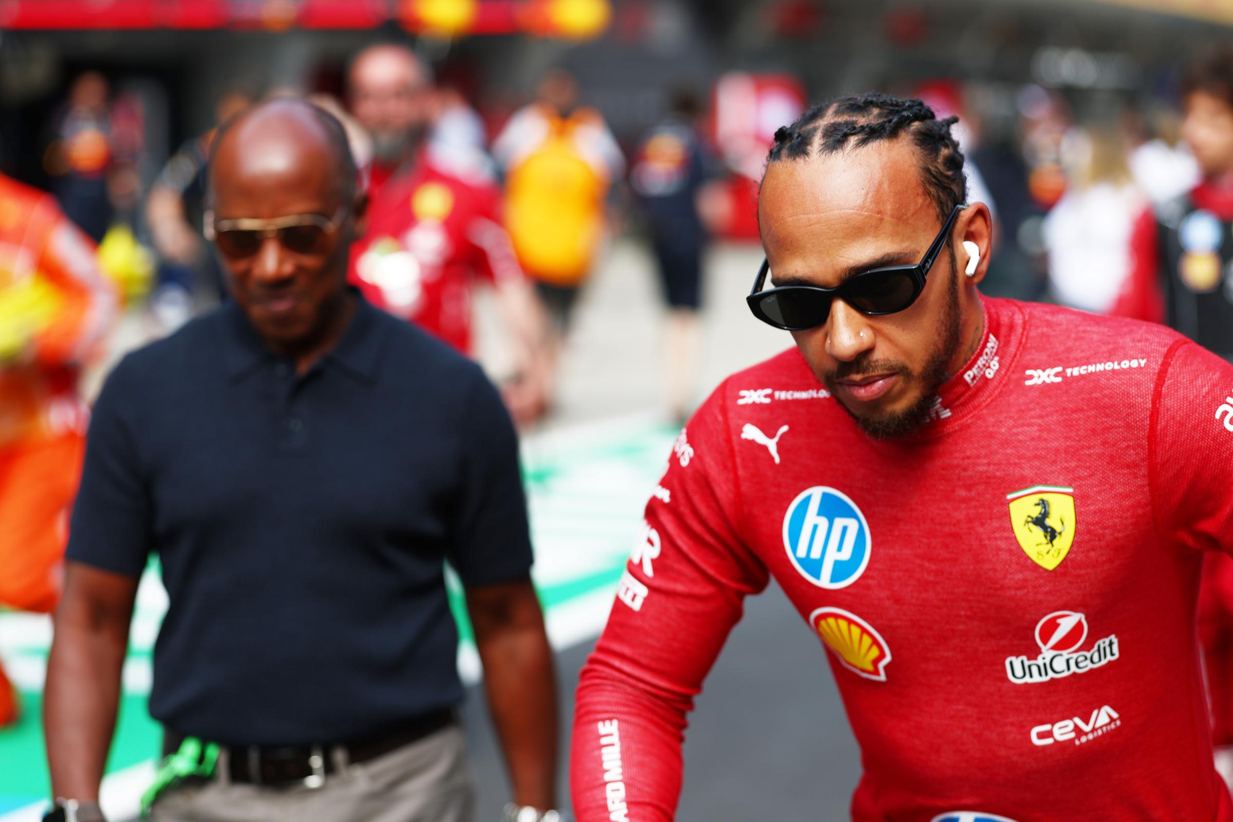 Anthony and Lewis Hamilton on the grid during the F1 Grand Prix of China at Shanghai International Circuit on March 23, 2025, in Shanghai, China. | Source: Getty Images
