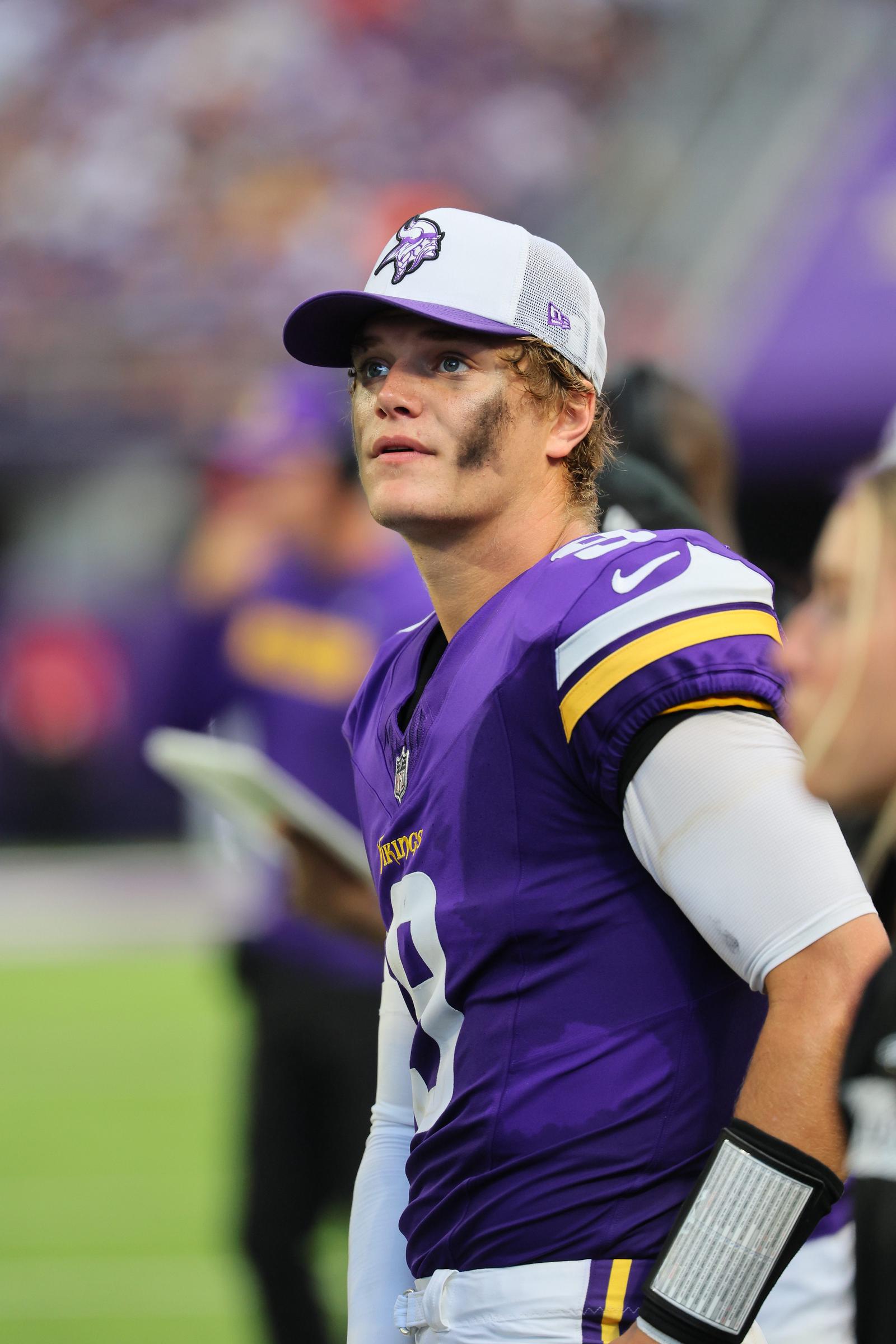 J.J. McCarthy watching from the sidelines during the pre-season game against Las Vegas Raiders at U.S. Bank Stadium on August 10, 2024, in Minneapolis, Minnesota. | Source: Getty Images
