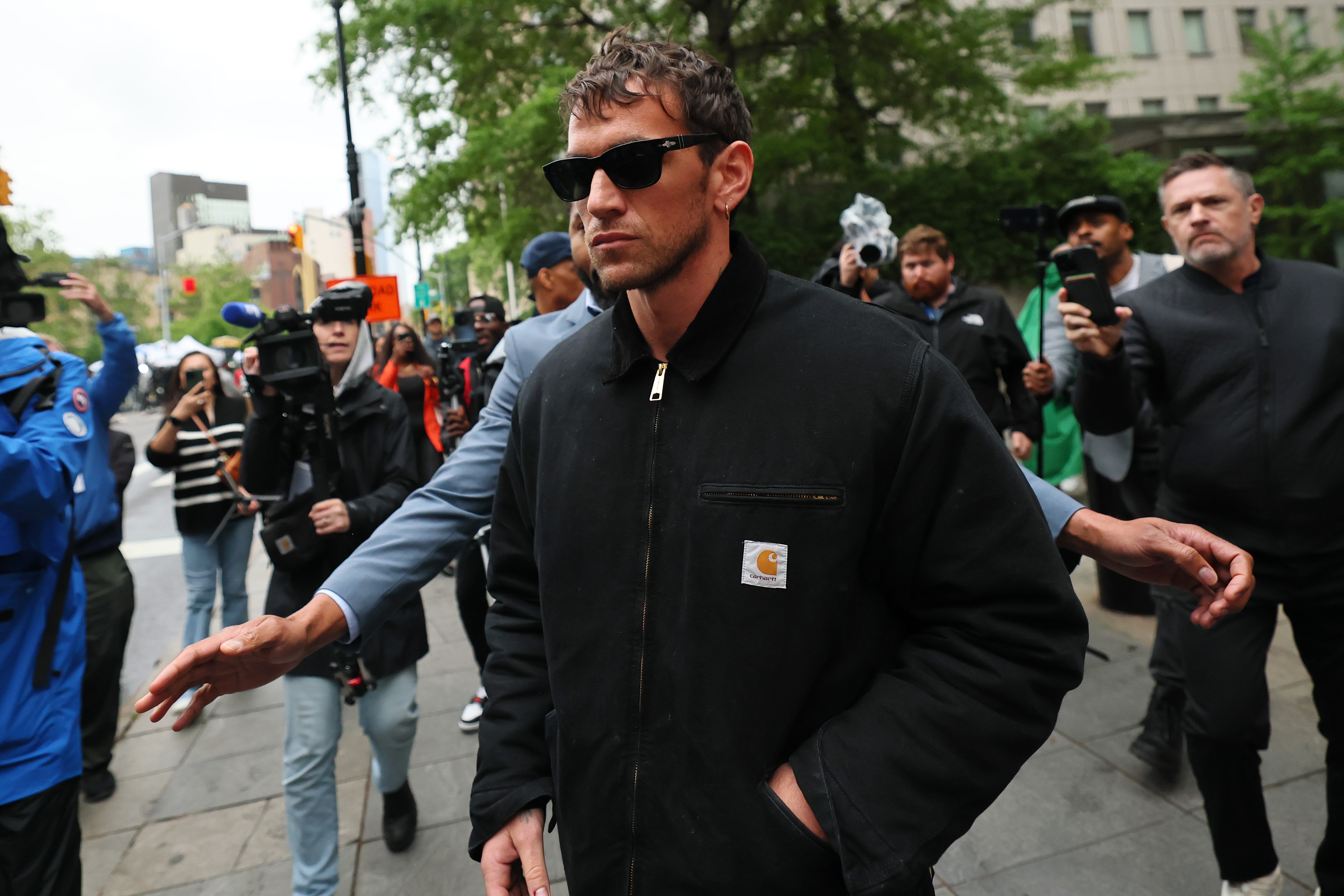 Alex Fine leaves Manhattan Federal Court on May 13, 2025 | Source: Getty Images