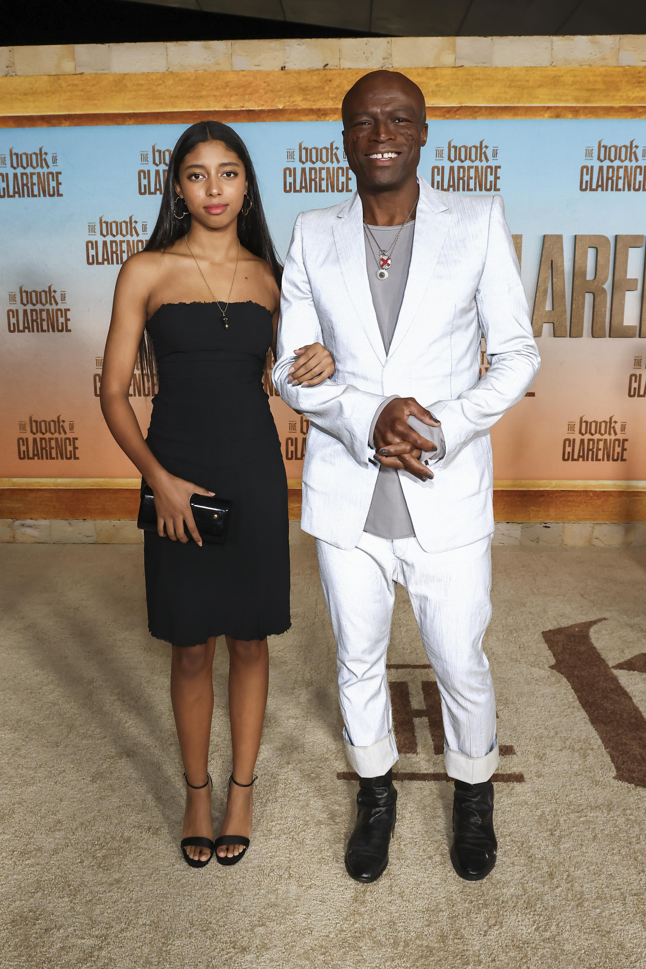 Lou appeared beside Seal at The Book of Clarence premiere in January 2024, giving viewers a rare father-daughter red-carpet image well before her first Paris Fashion Week. | Getty Images