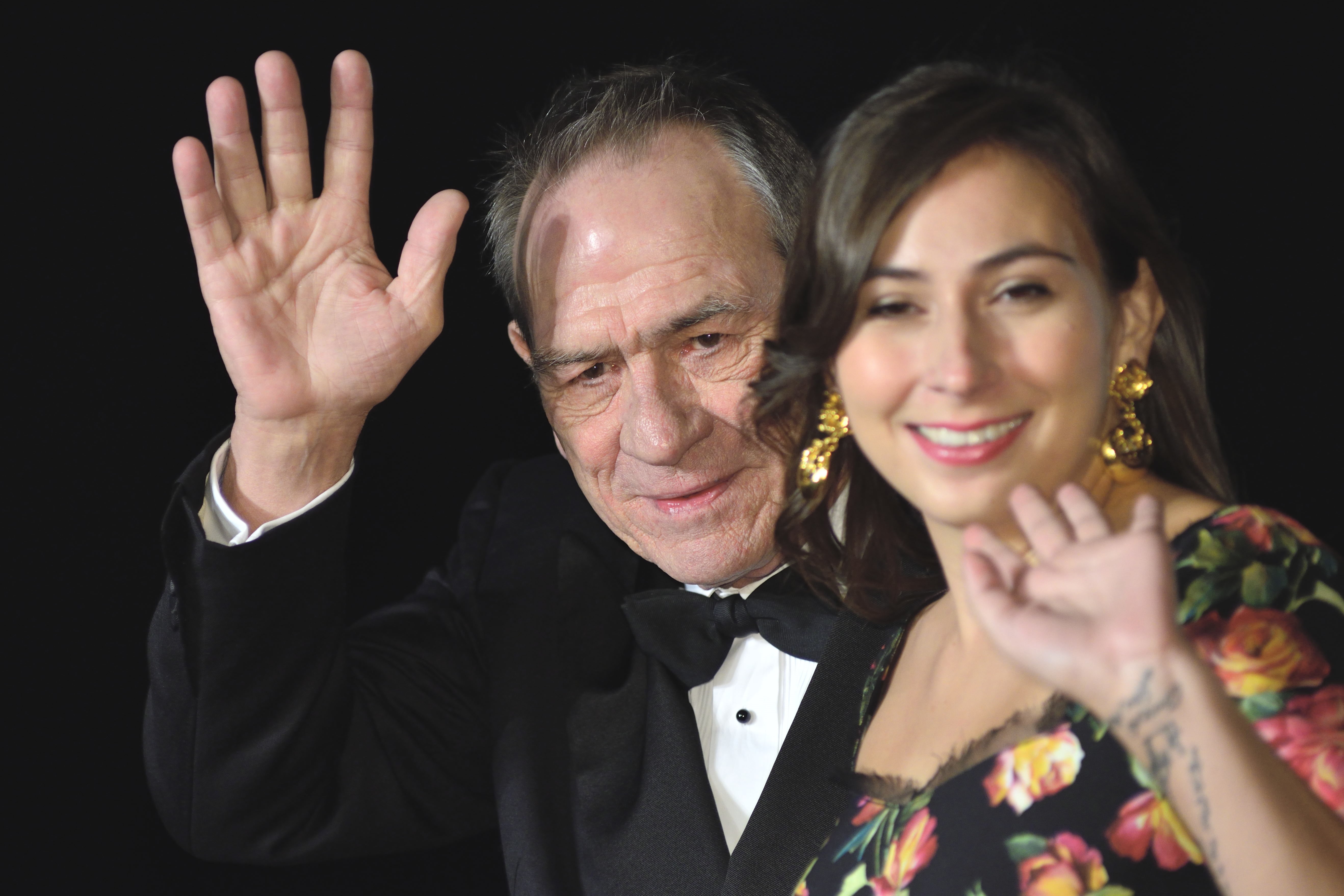 Victoria and Tommy Lee Jones wave to the crowd at the 30th Tokyo International Film Festival at Roppongi Hills on October 25, 2017 in Japan.  | Source: Getty Images