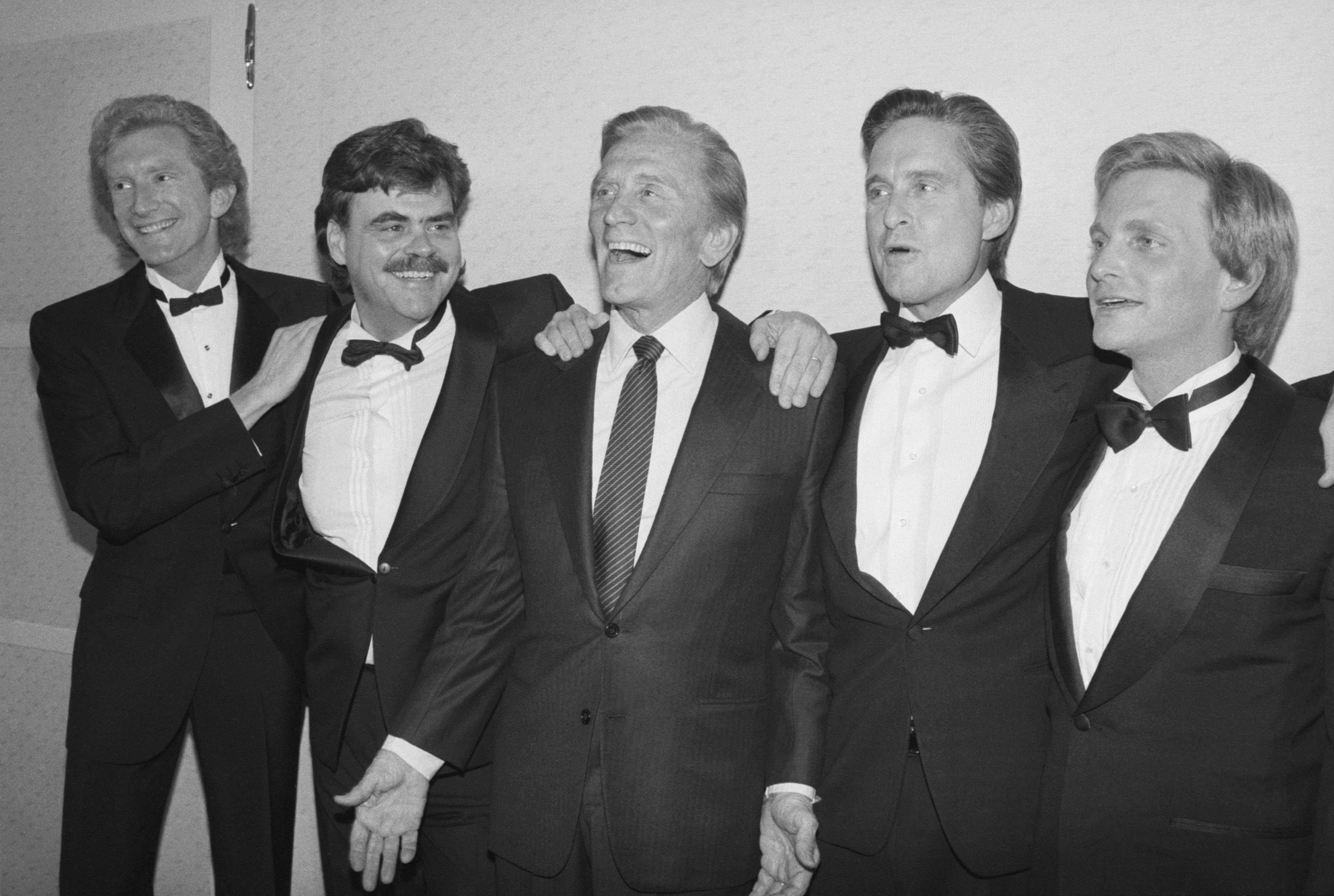Kirk Douglas made sure his sons and other family members received meaningful parts of his estate. In this photo, he posed with Peter, Joel, Michael, and Eric during a gala evening where he was honored by the American Academy of Dramatic Arts at Majestic Theatre on April 6, 1987, in Manhattan, New York. | Source: Getty Images