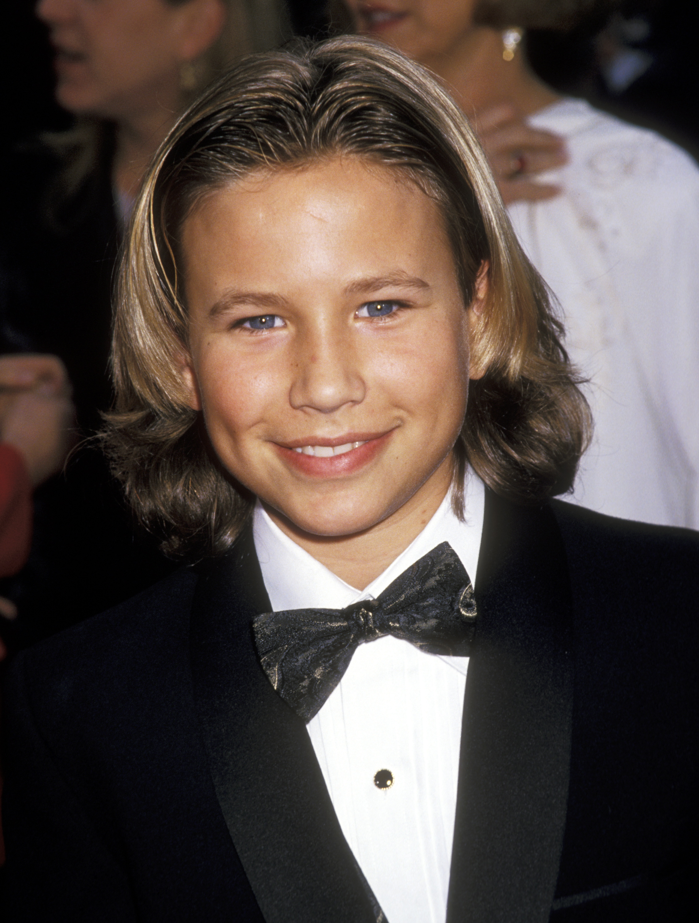 Jonathan Taylor Thomas arrived in a classic black tuxedo and bow tie for the First Annual Screen Actors Guild Awards at Universal Studios in Universal City, California, on February 25, 1995. By then, the young actor was several seasons into his role as Randy Taylor on "Home Improvement," while his work as young Simba in "The Lion King" and other projects had helped make him one of the era's most recognizable young stars.