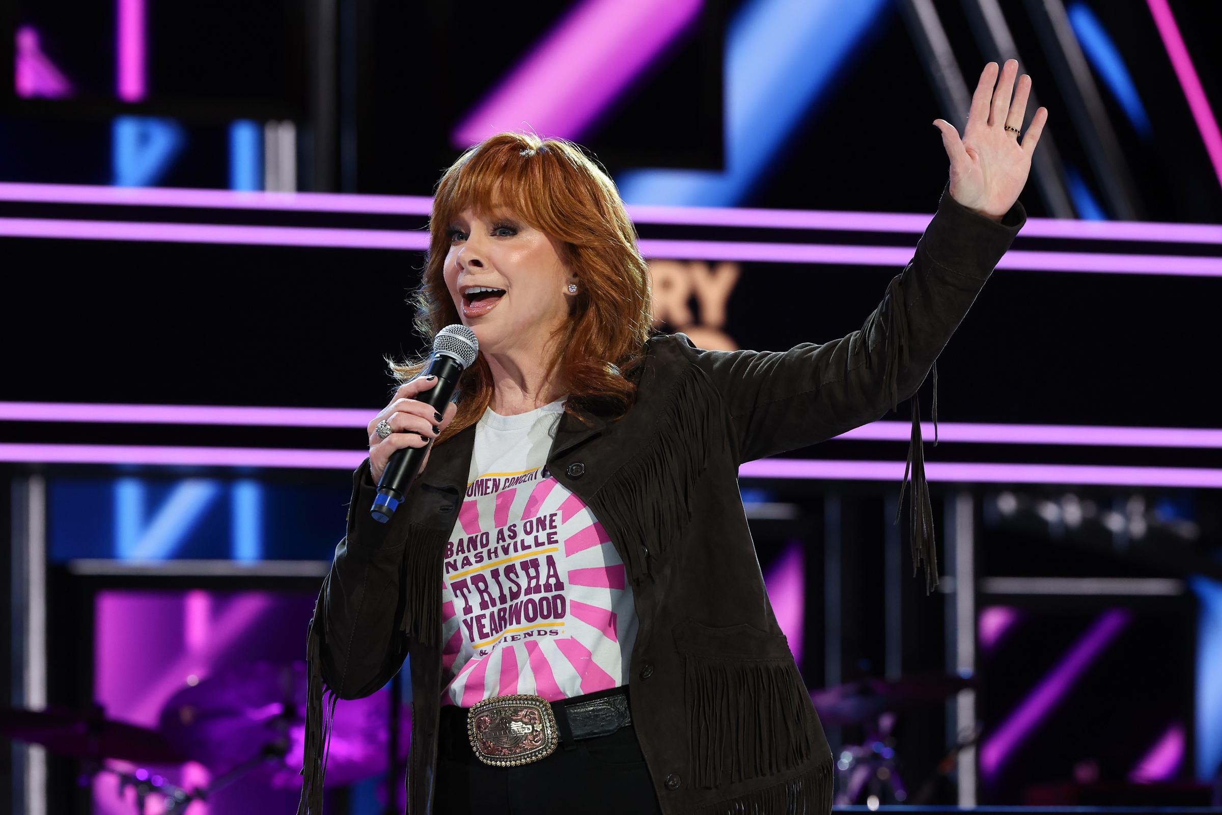 Reba McEntire remained busy with music in 2026, performing at the Band As One Nashville benefit in March while her wedding plans with Rex Linn remained unsettled. | Source: Getty Images
