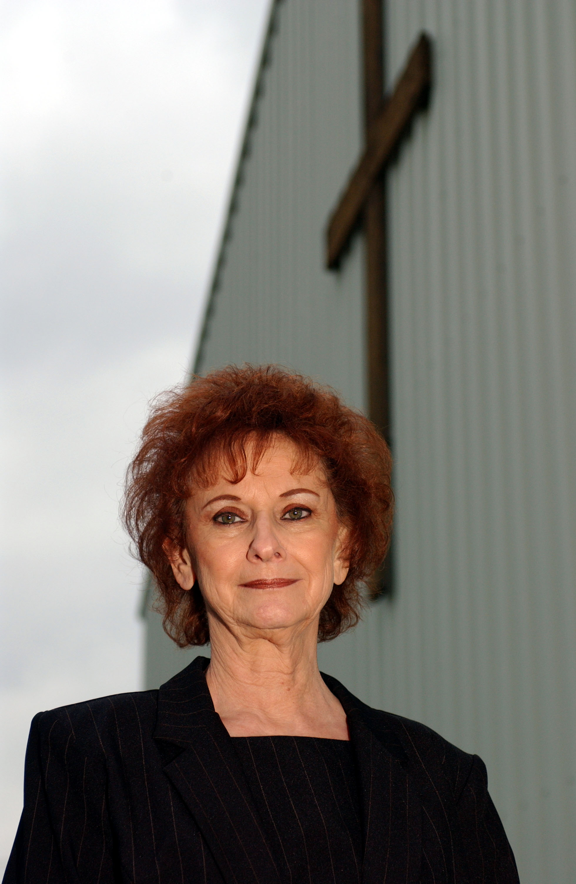 Betty Kresin poses outside of a church following a memorial service for her son, Todd Nelson Sr., on October 22, 2004 | Source: Getty Images