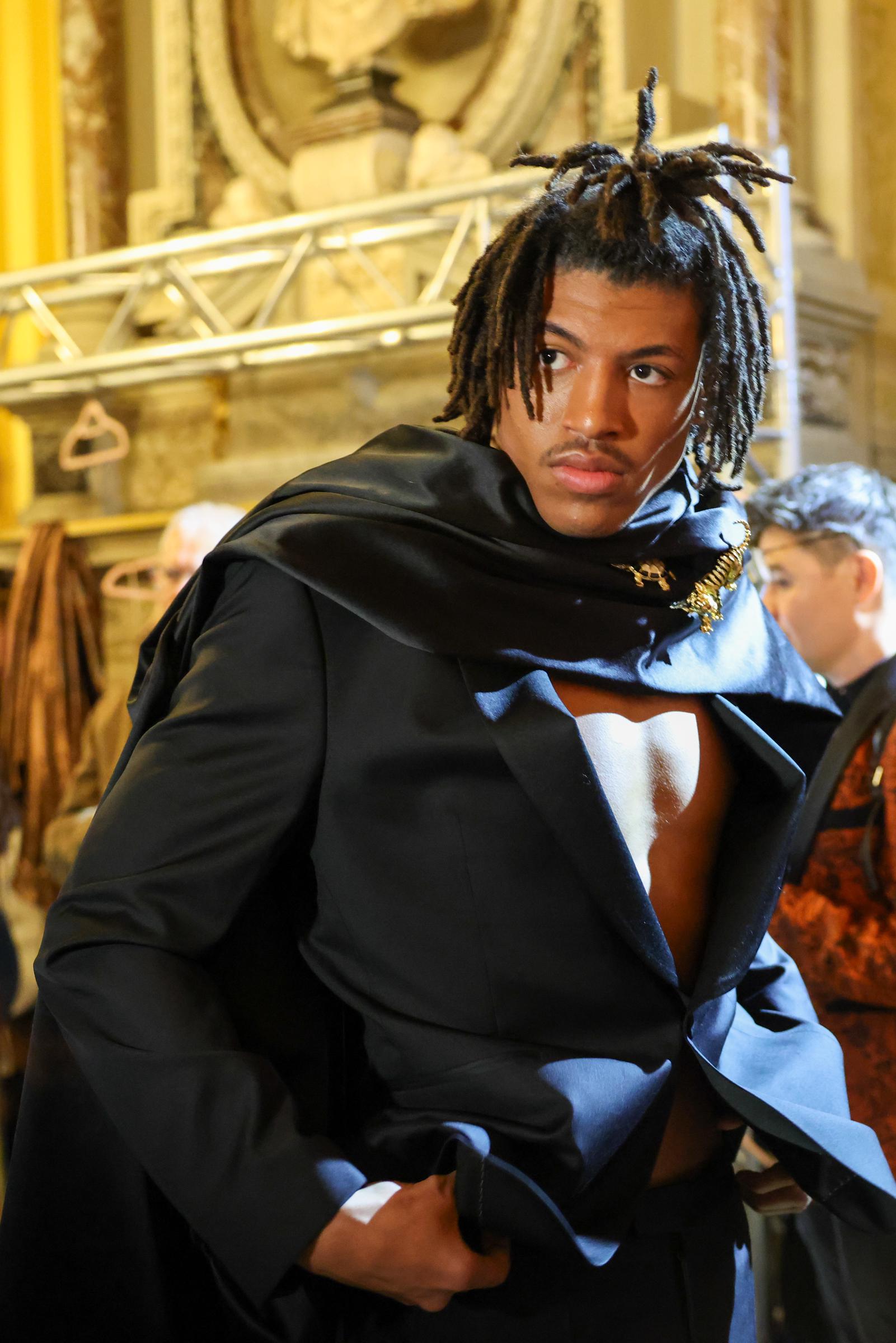 Henry Samuel is seen backstage after the Lena Erziak Haute Couture Spring-Summer show as part of Paris Fashion Week at Hotel le Marois on January 28, 2025, in Paris, France | Source: Getty Images